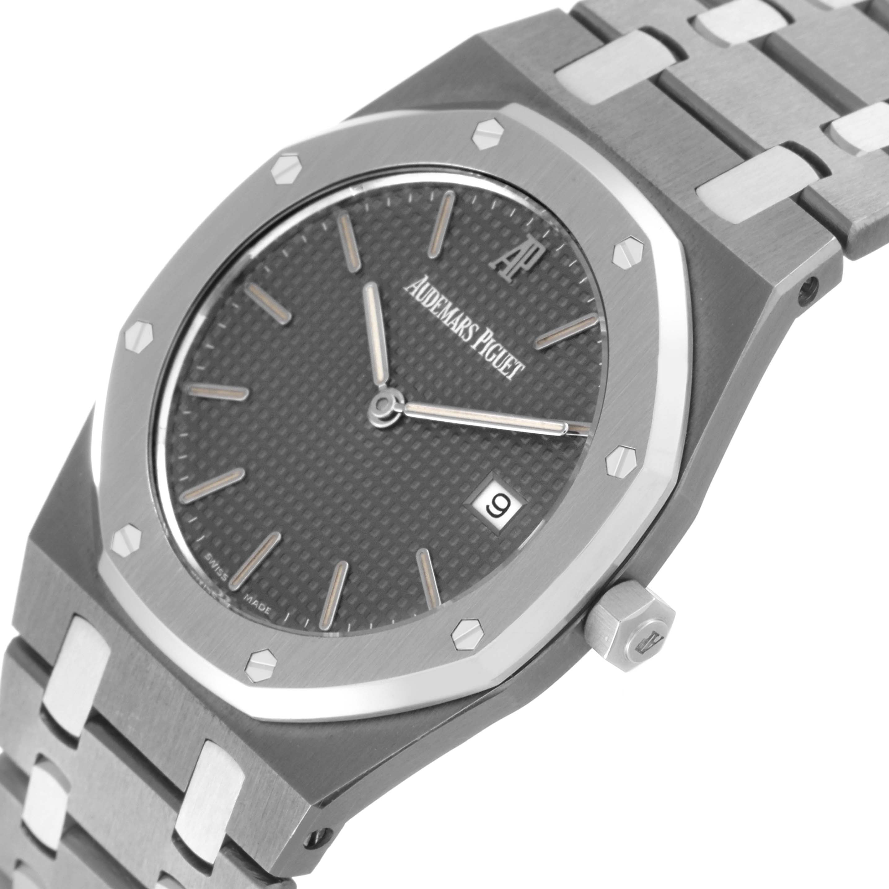 This image shows a close-up angled view of the dial, bezel, and bracelet of the Audemars Piguet Royal Oak 56175TT.00.0789TT.01 Men's Stainless Steel Grey Dial 56175TT.00.0789TT.01 Men's Stainless Steel Grey Dial watch.