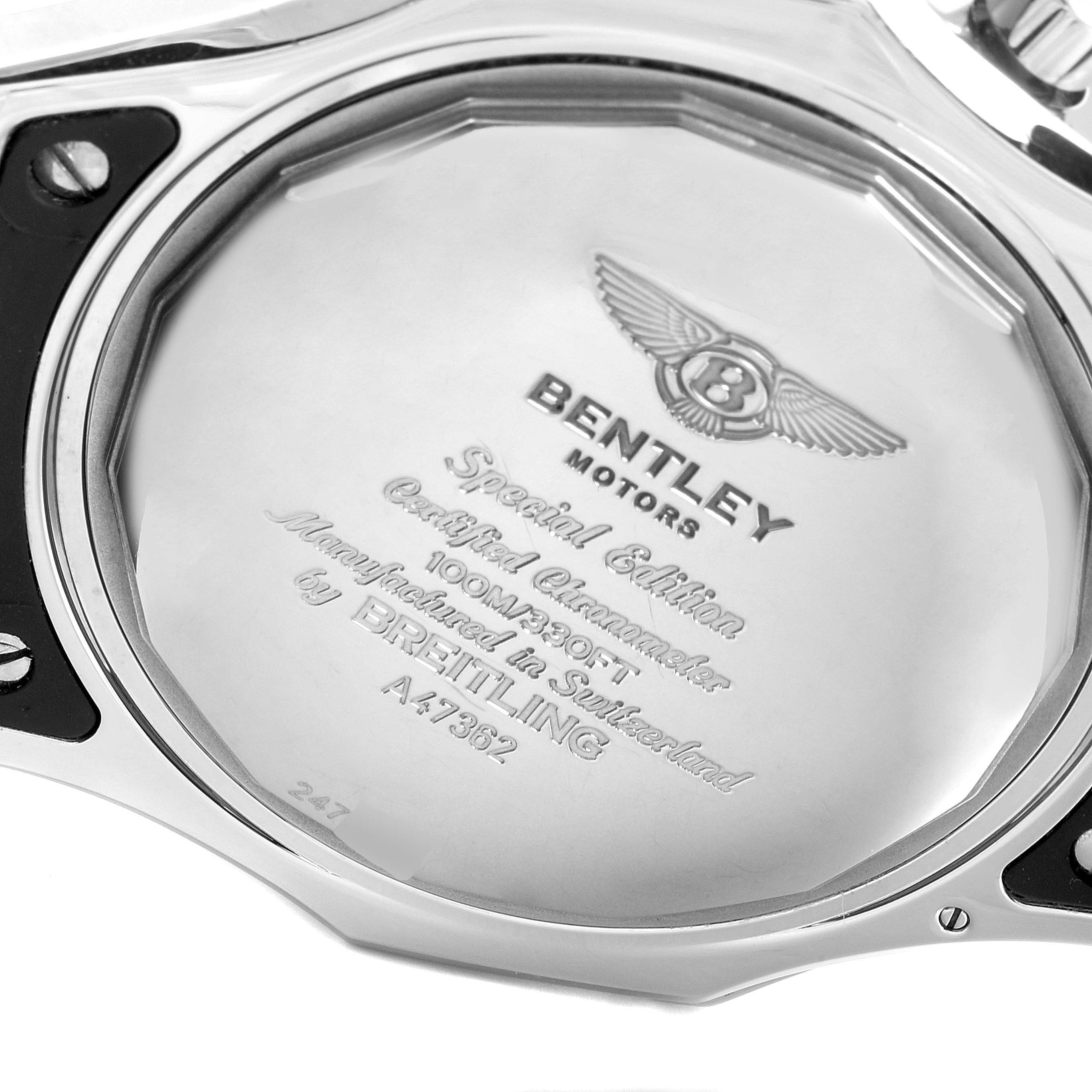 The image shows the back case of a Bentley model watch by Breitling, highlighting its engravings and logo.