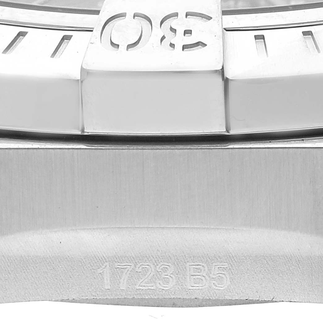 The image shows a close-up of the bezel and case of the Breitling Chronomat A32397 Men's Stainless Steel Black Dial A32397 Men's Stainless Steel Black Dial watch.