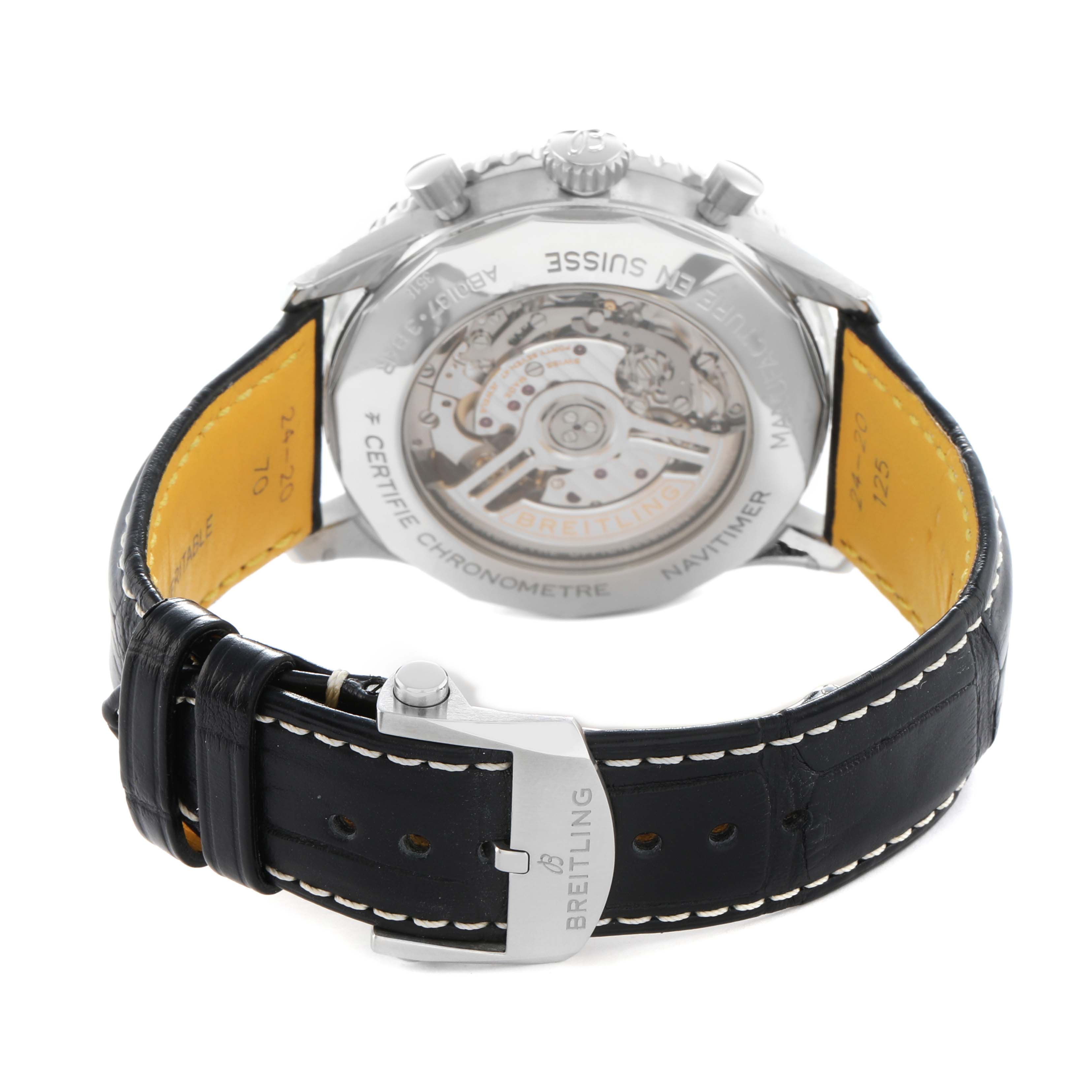 The Breitling Navitimer AB0137 Men's Stainless Steel Green Dial watch is shown from the back, displaying the transparent case back and inner mechanics, with a leather strap.