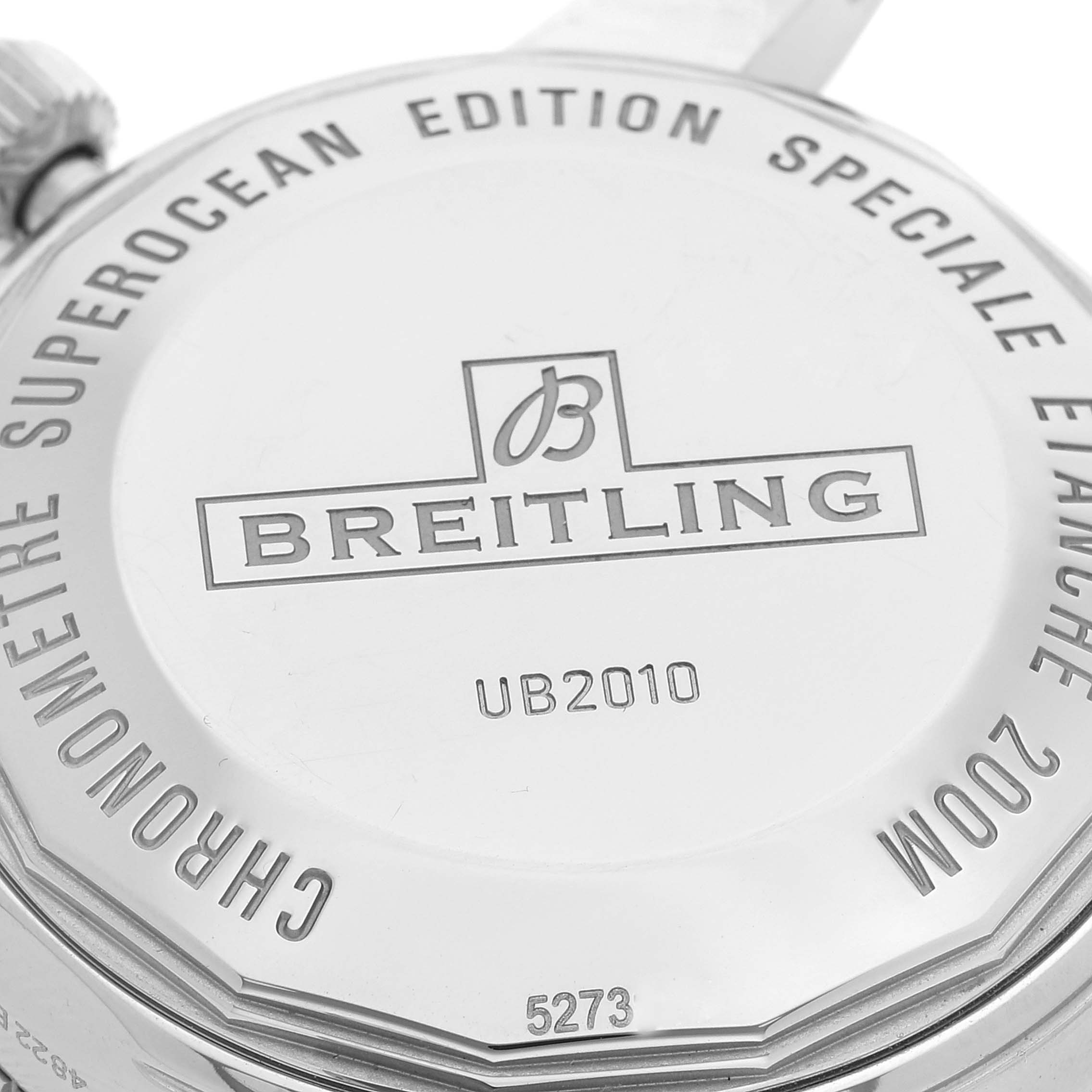 The image shows the case back of a Breitling Superocean UB2010 Men's Stainless Steel Black Dial UB2010 Men's Stainless Steel Black Dial watch, highlighting engravings and model details.