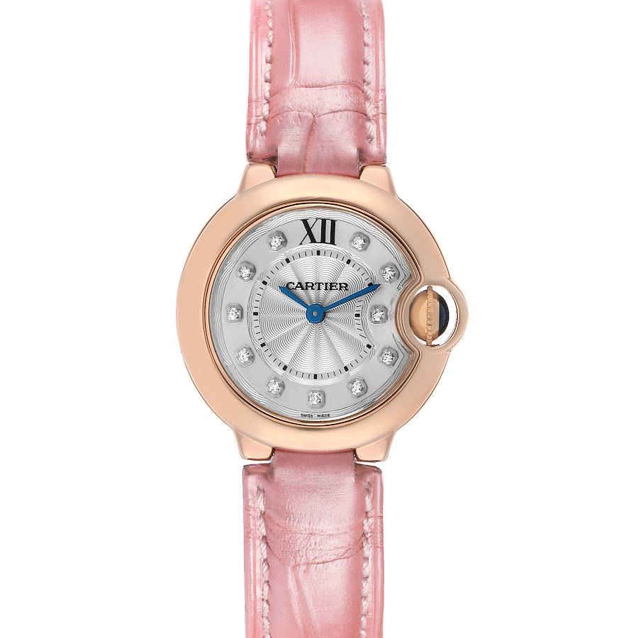 The Cartier Ballon Bleu WE902050 Women's Rose Gold Silver Dial watch is shown from a front angle, featuring a pink leather strap and diamond indices.