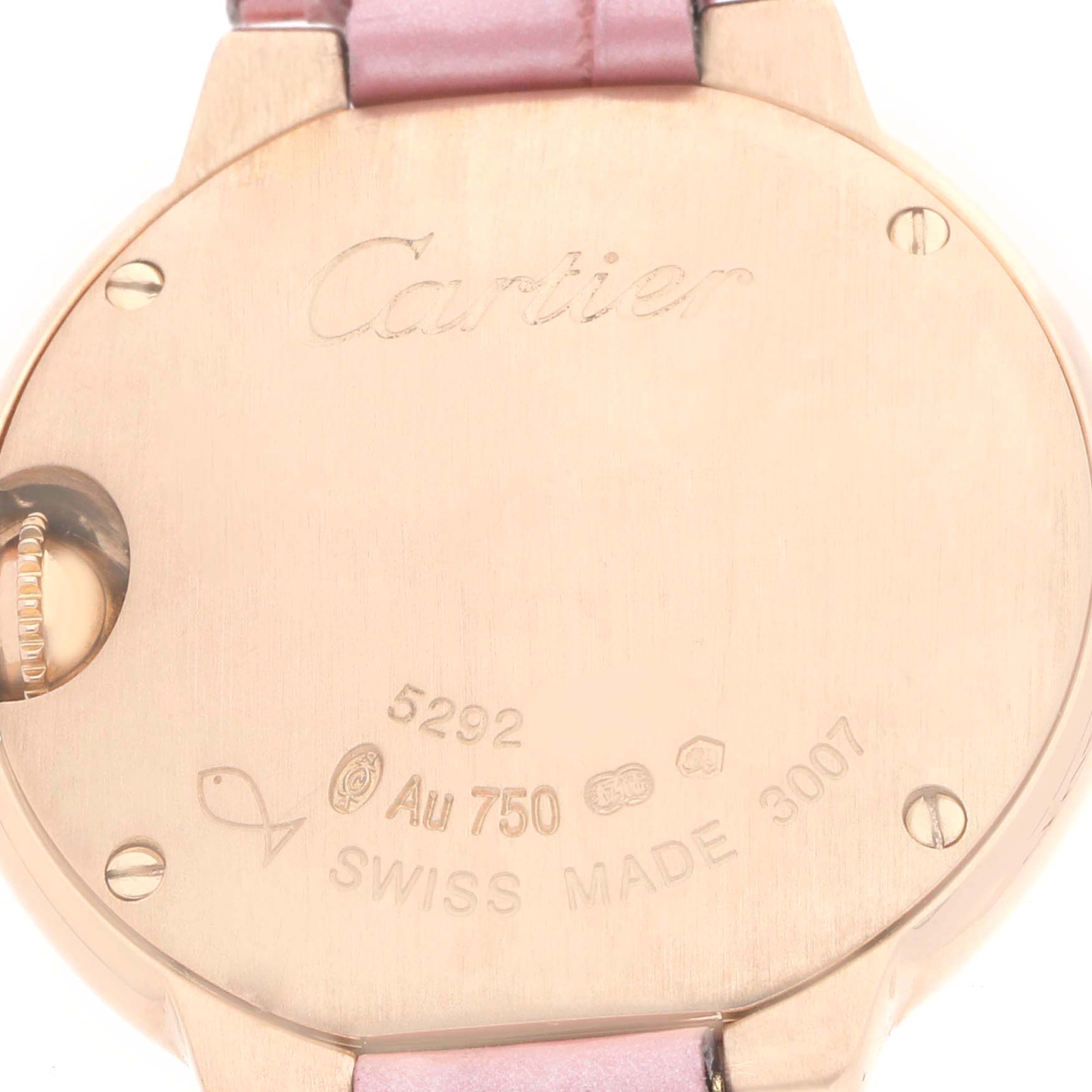 The image shows the back of a Cartier Ballon Bleu WE902050 Women's Rose Gold Silver Dial watch, highlighting engravings and the crown on the side.