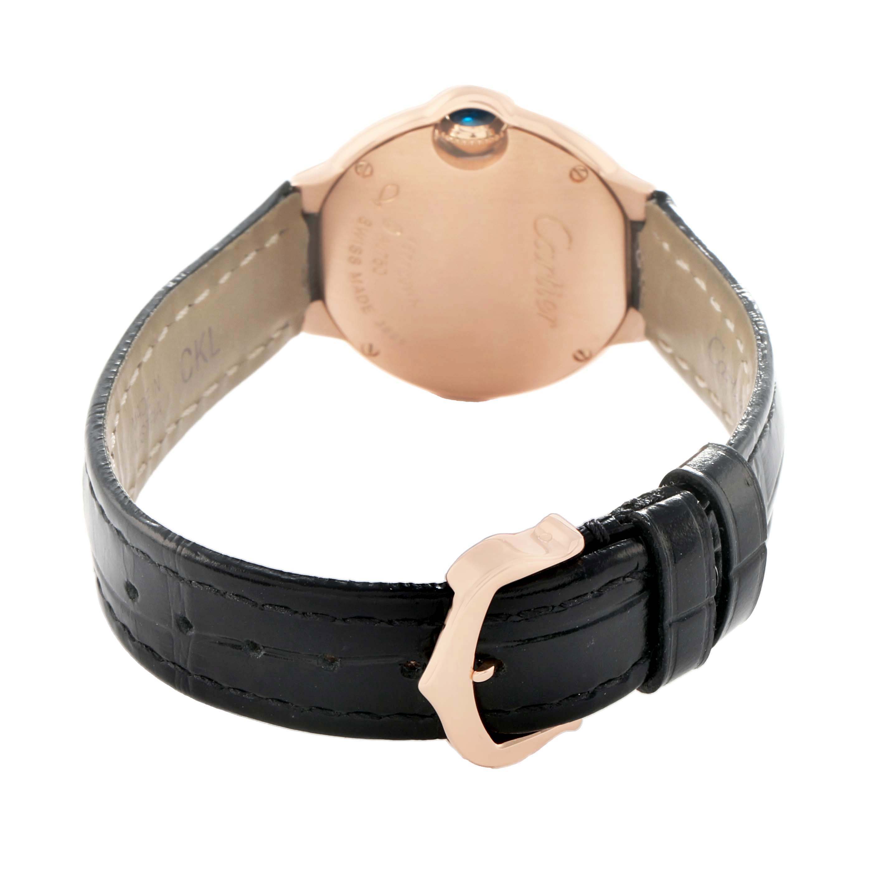 The image shows the back of the Cartier Ballon Bleu WJBB0019 Women's Rose Gold Silver Dial watch and part of its leather strap with a visible clasp.