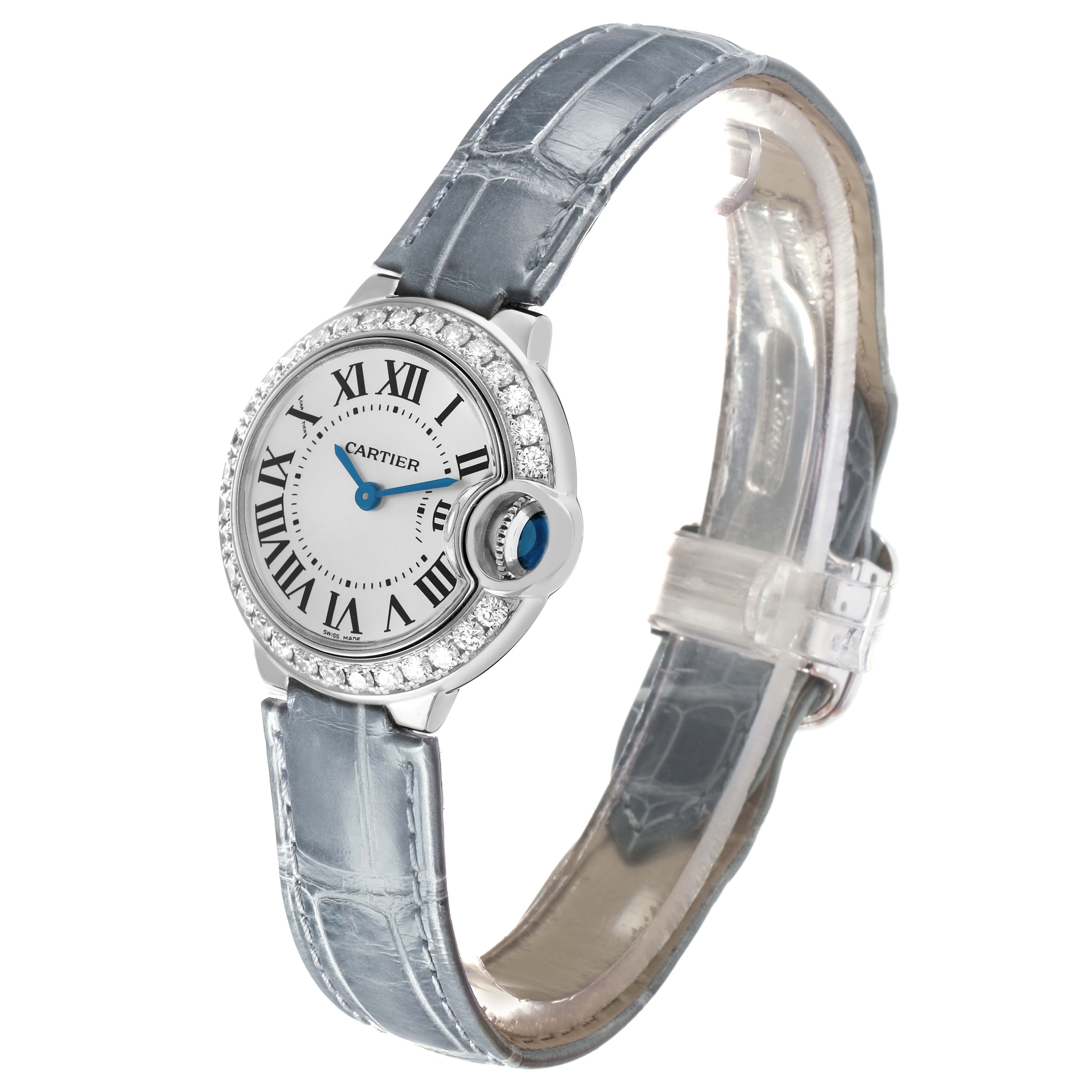 The Cartier Ballon Bleu WE900351 Women's White Gold Silver Dial watch is shown at an angled viewpoint, displaying the face, diamond bezel, crown, and leather strap.