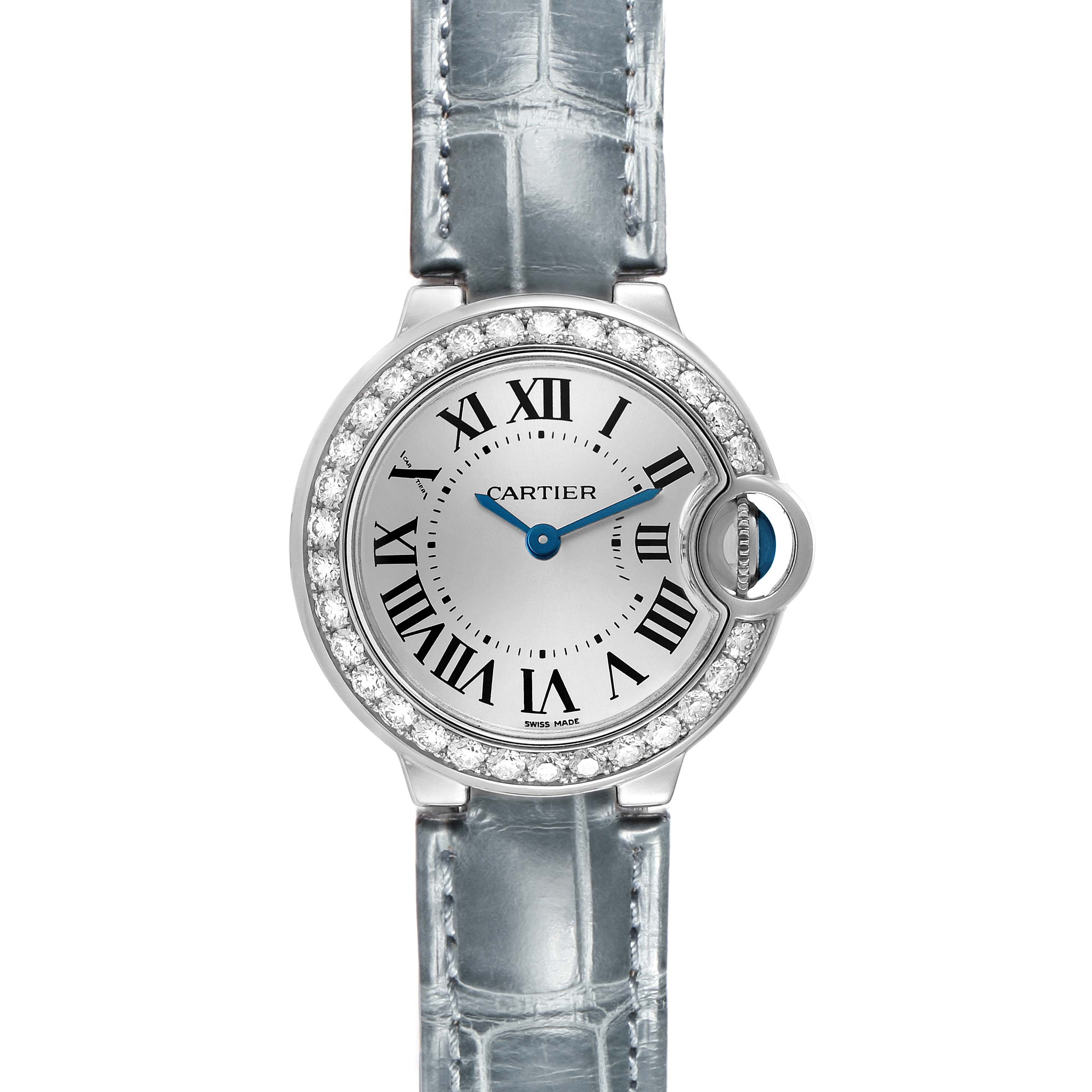 The image shows a Cartier Ballon Bleu WE900351 Women's White Gold Silver Dial watch from a top-down angle, highlighting the face, Roman numerals, and diamond-studded bezel.