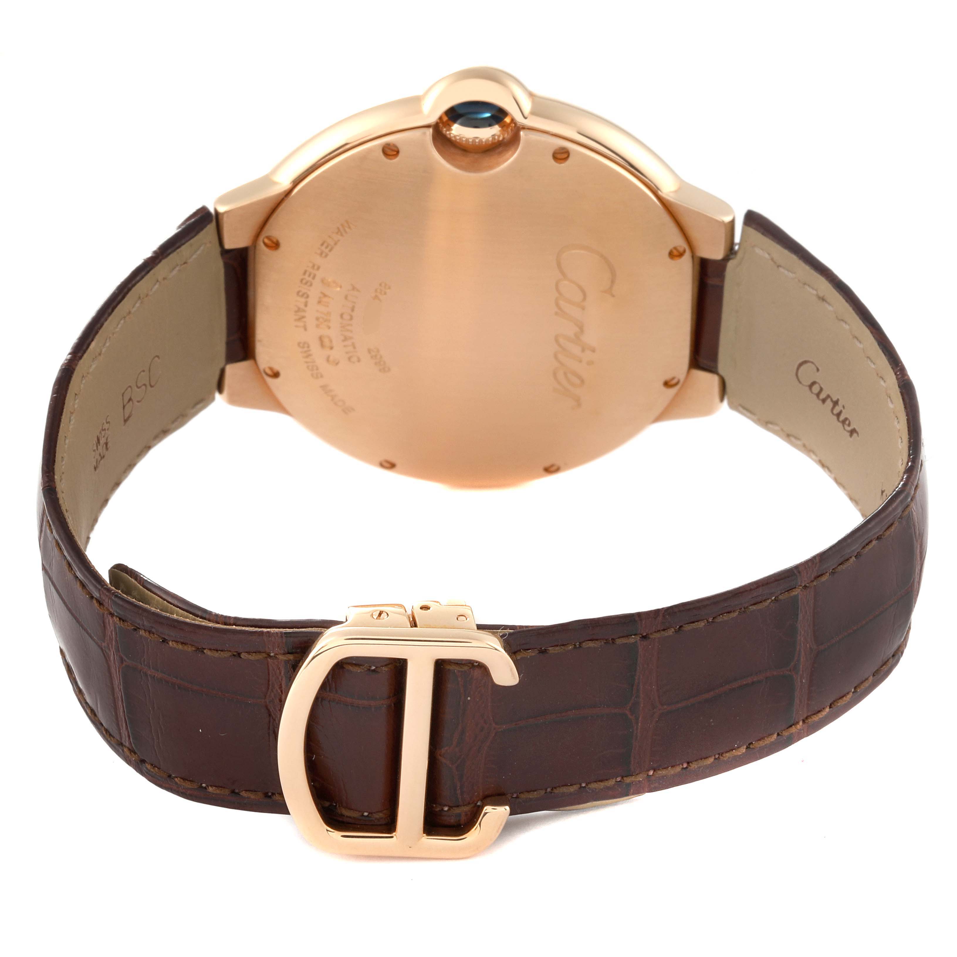 The image shows the back of the Cartier Ballon Bleu W6920037 Men's Rose Gold Brown Dial W6920037 Men's Rose Gold Brown Dial watch, highlighting its case, crown, and leather strap with the Cartier signature deployant buckle.
