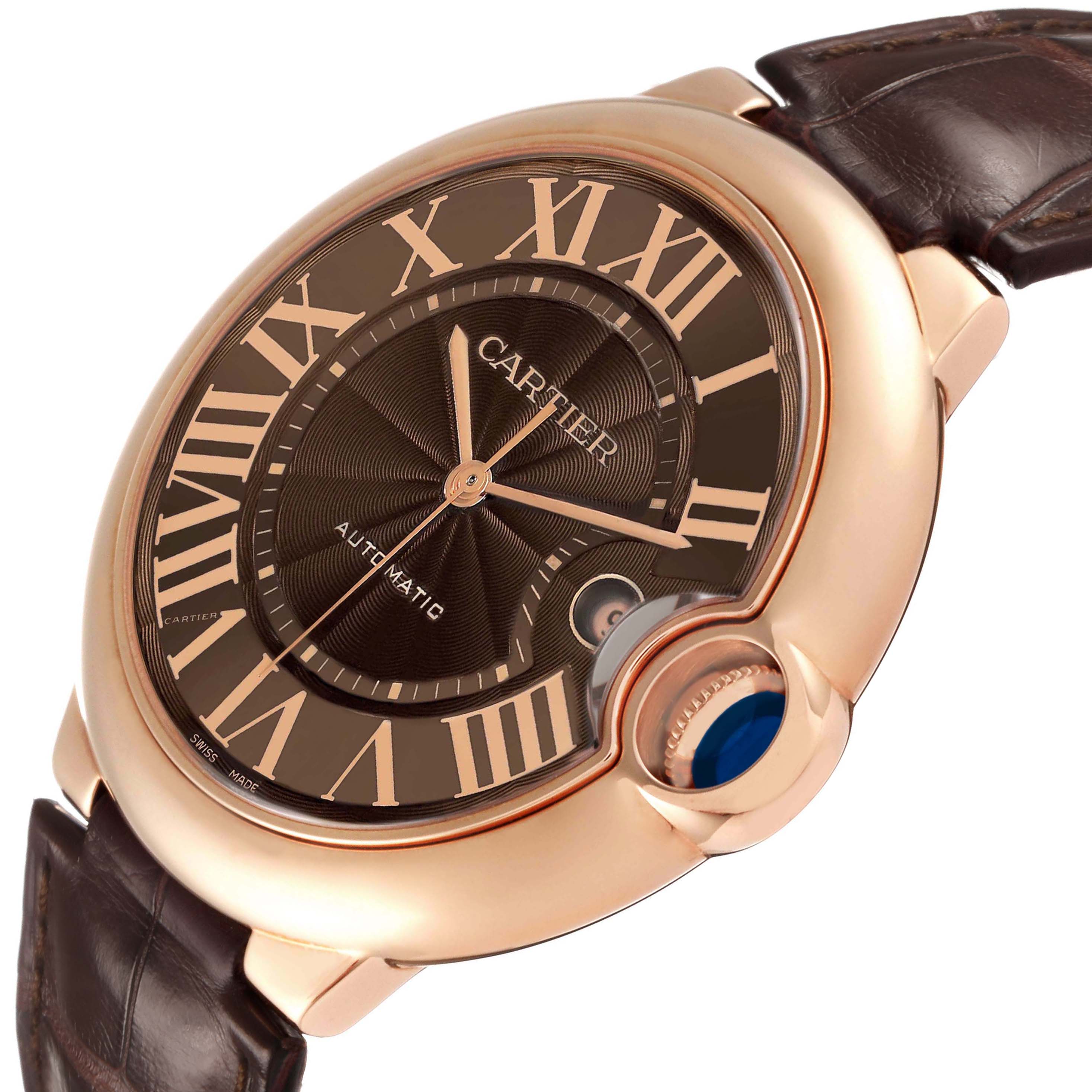 The Cartier Ballon Bleu W6920037 Men's Rose Gold Brown Dial watch is shown at an angle displaying the dial, Roman numerals, and crown with its distinctive blue cabochon.