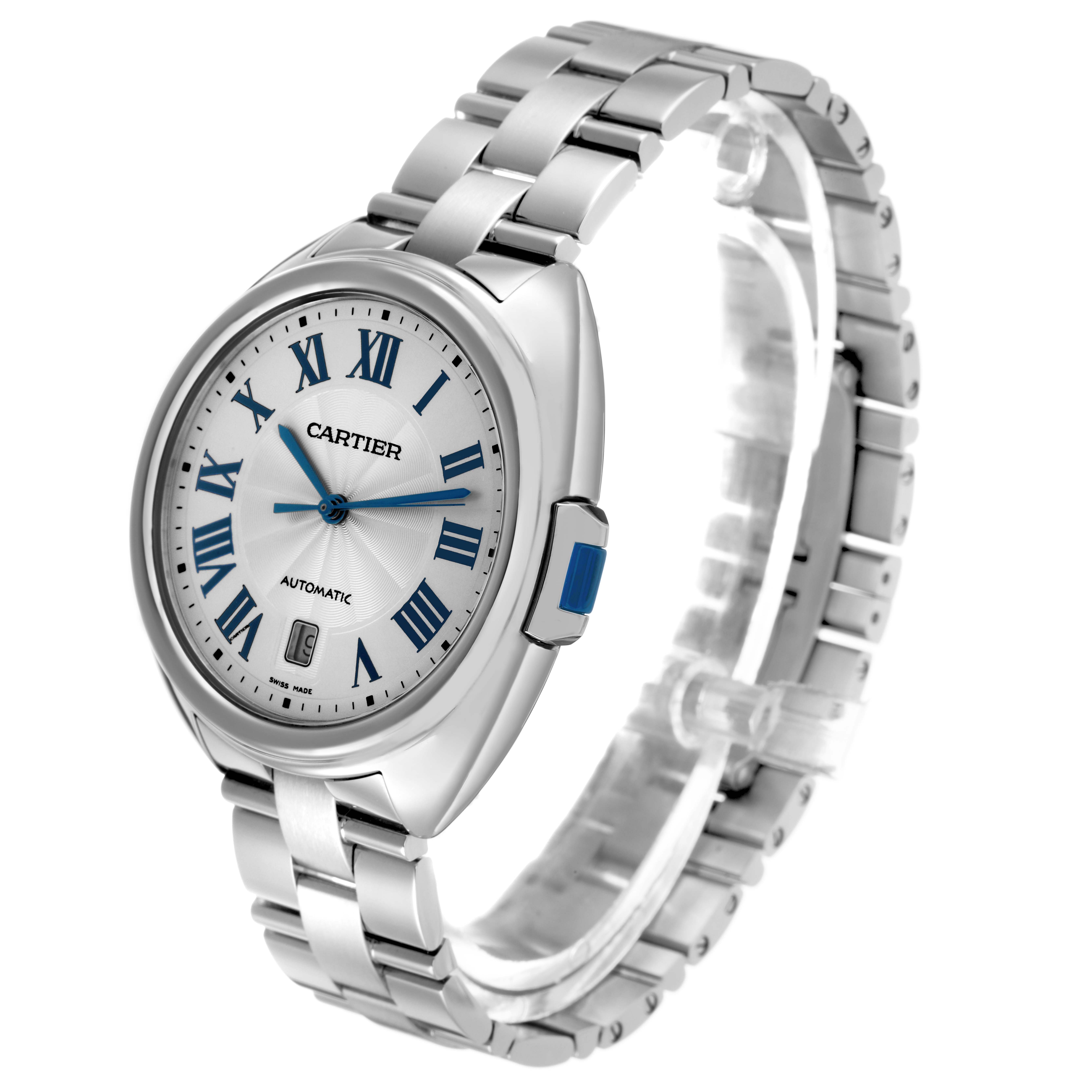 The Cartier Clé watch is shown at a three-quarter angle, highlighting its face, bezel, and linked bracelet.