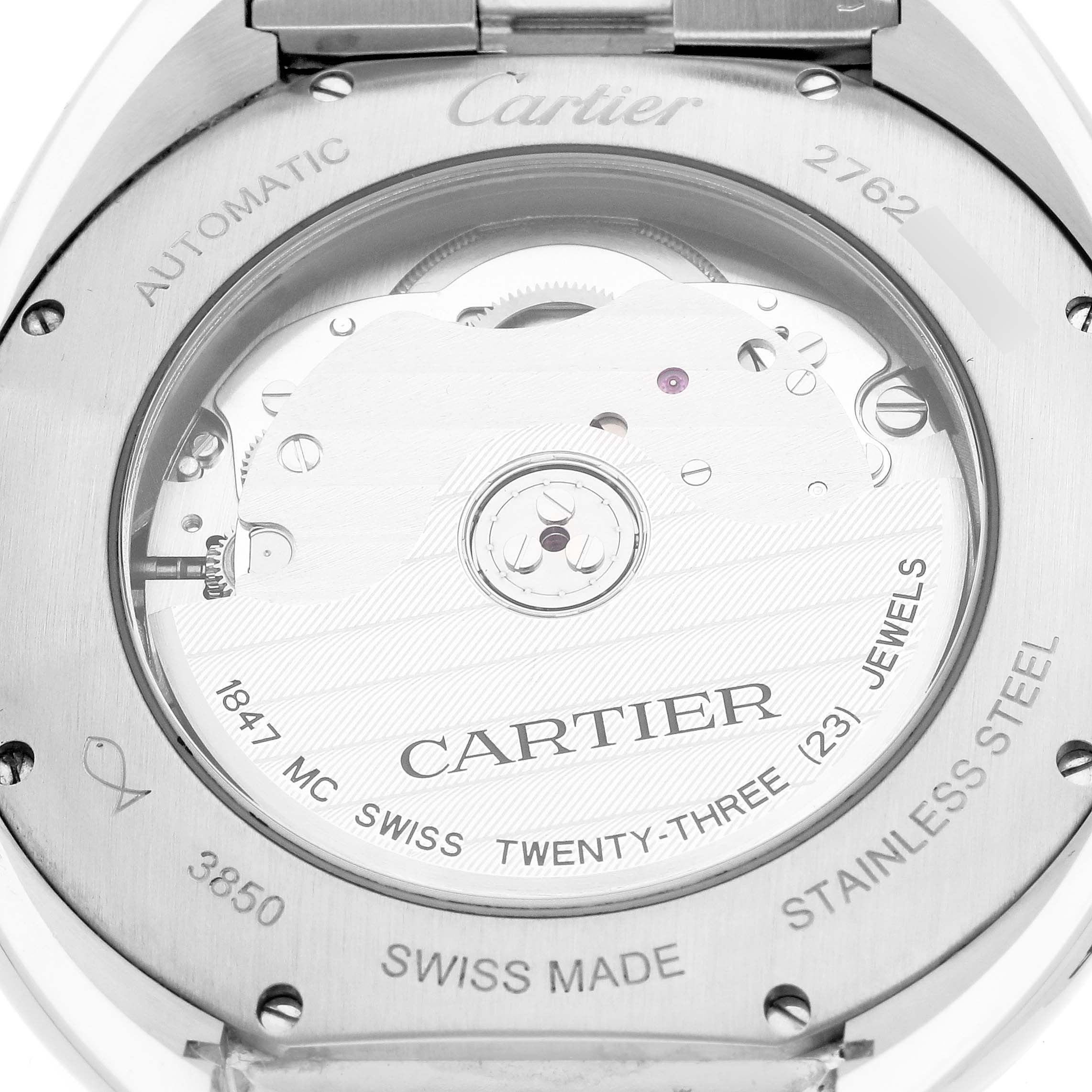 The image shows the back view of a Cartier Clé watch, revealing its automatic movement and detailed engravings.