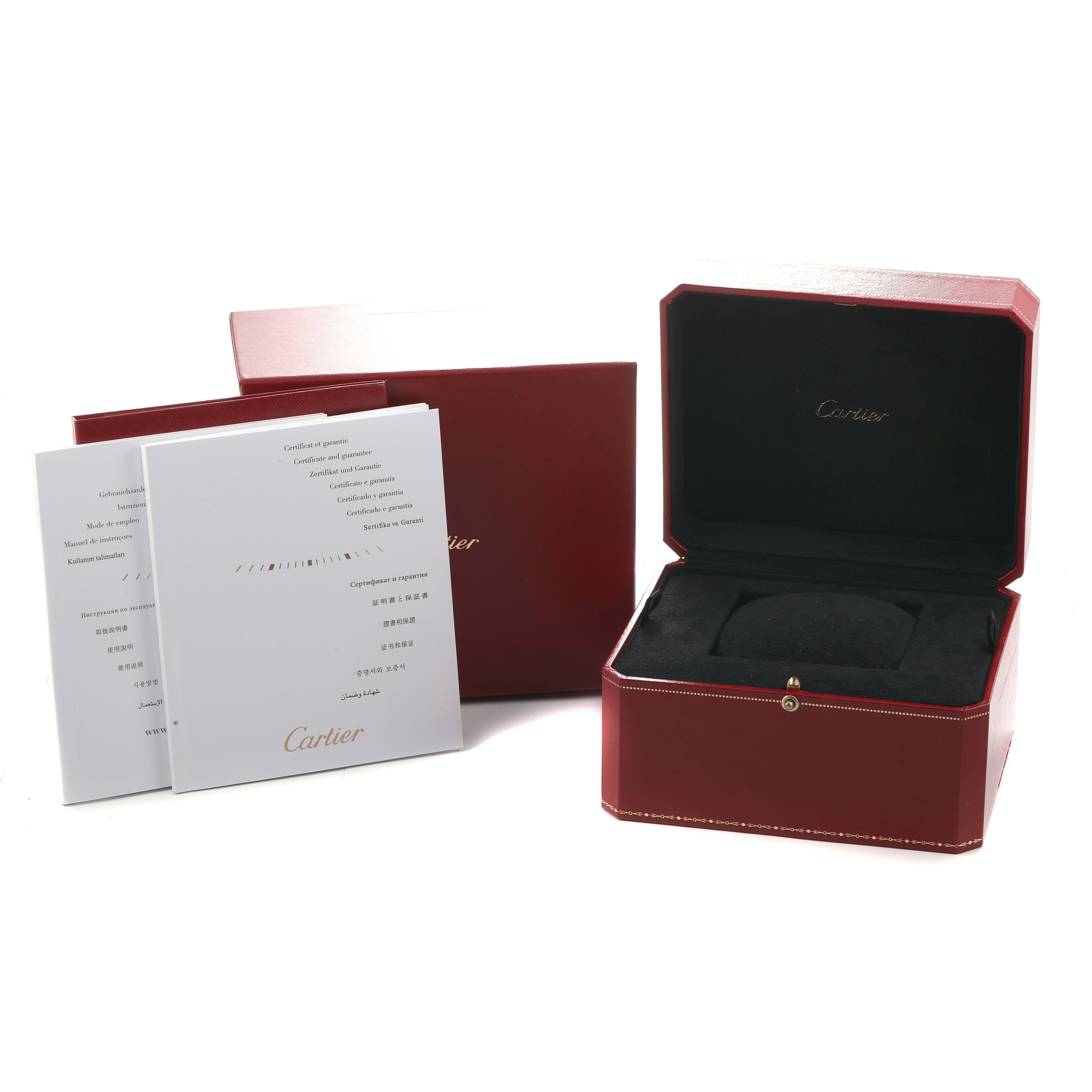 The image shows a Cartier Cle WSCL0007 Men's Stainless Steel Silver Dial watch box and documentation, with the box open and manuals displayed beside it.