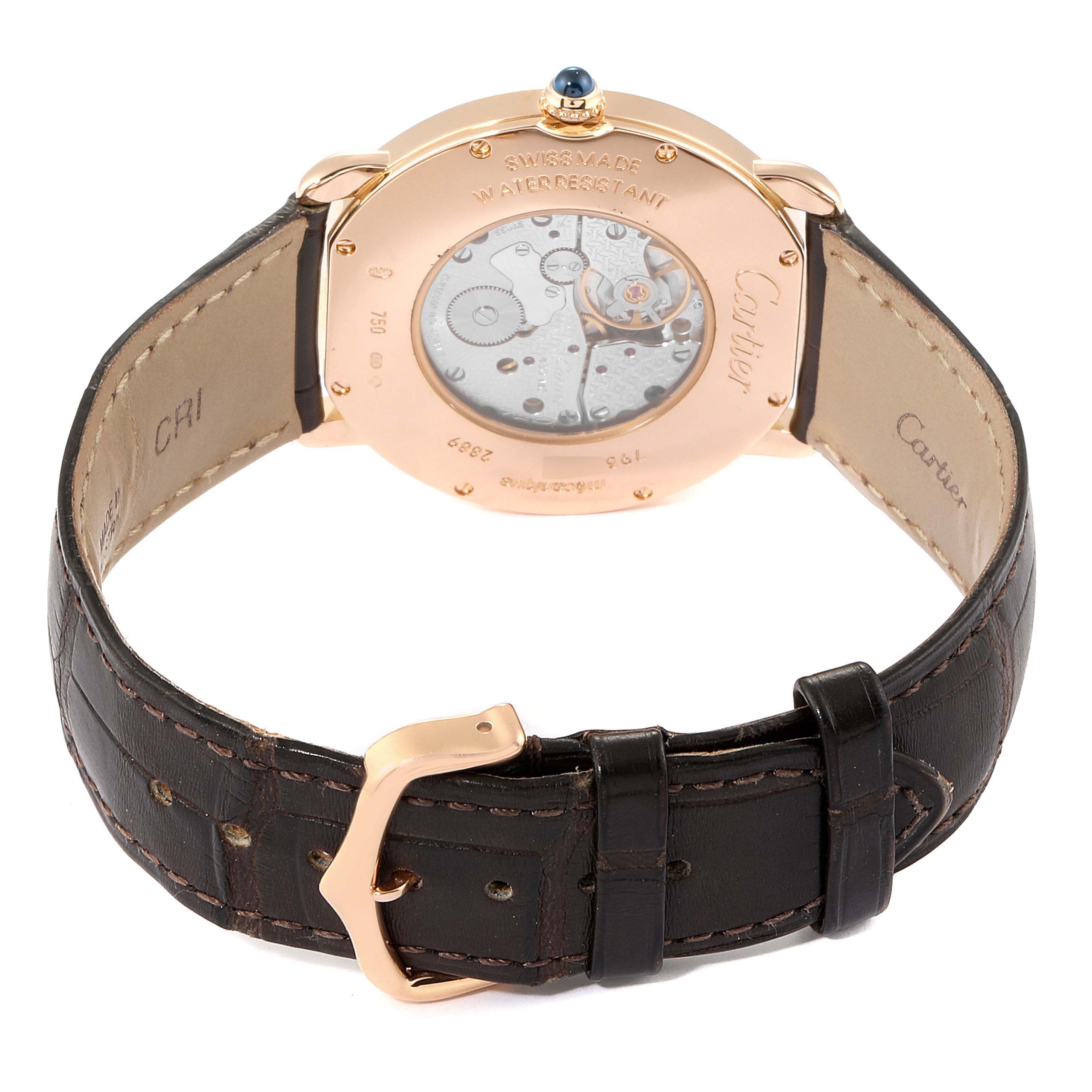 The image shows the back view of a Cartier Ronde W6800251 Men's Rose Gold Silver Dial W6800251 Men's Rose Gold Silver Dial watch, including its leather strap and visible movement.