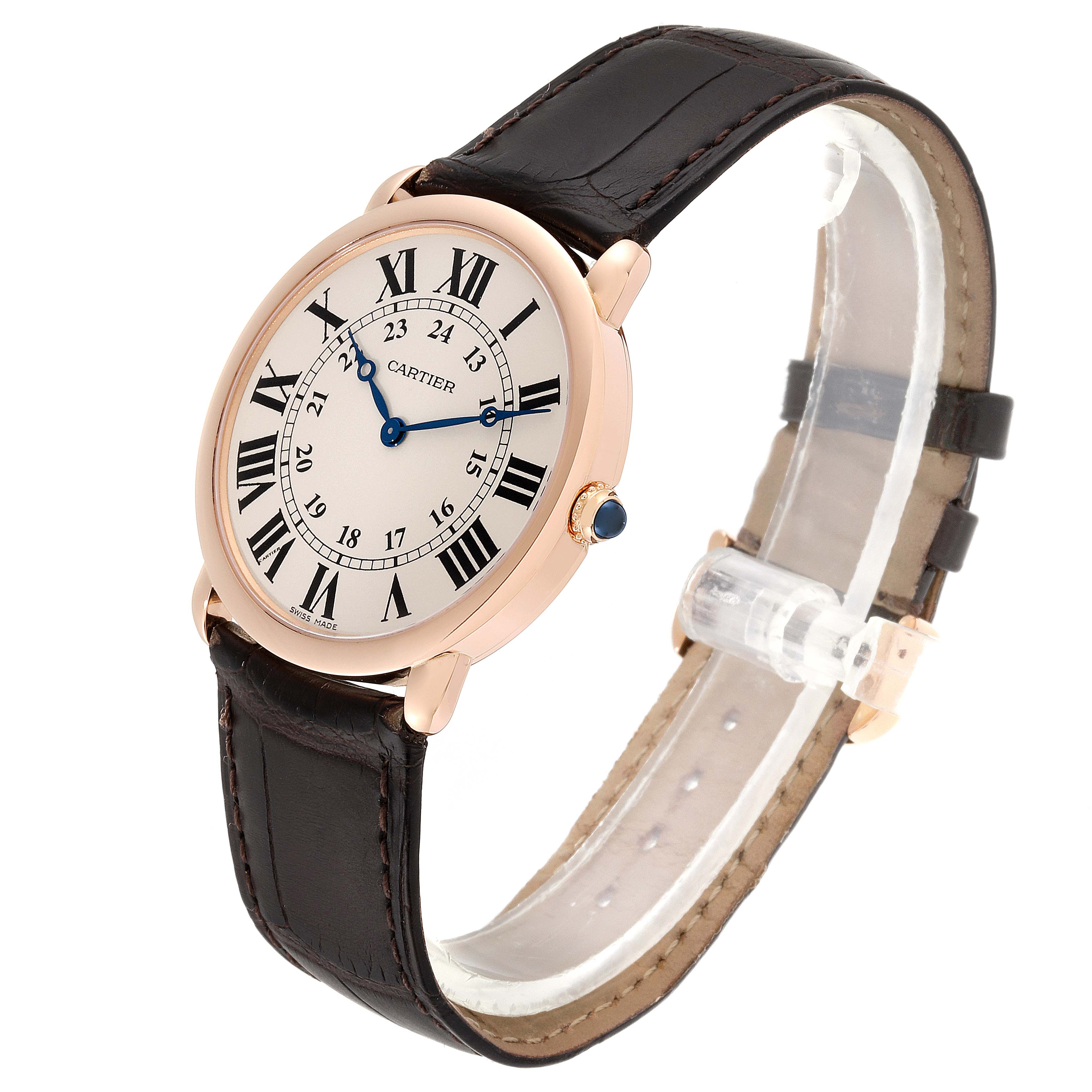 This image shows a Cartier Ronde W6800251 Men's Rose Gold Silver Dial W6800251 Men's Rose Gold Silver Dial model watch at an angle highlighting its face, leather strap, and crown.