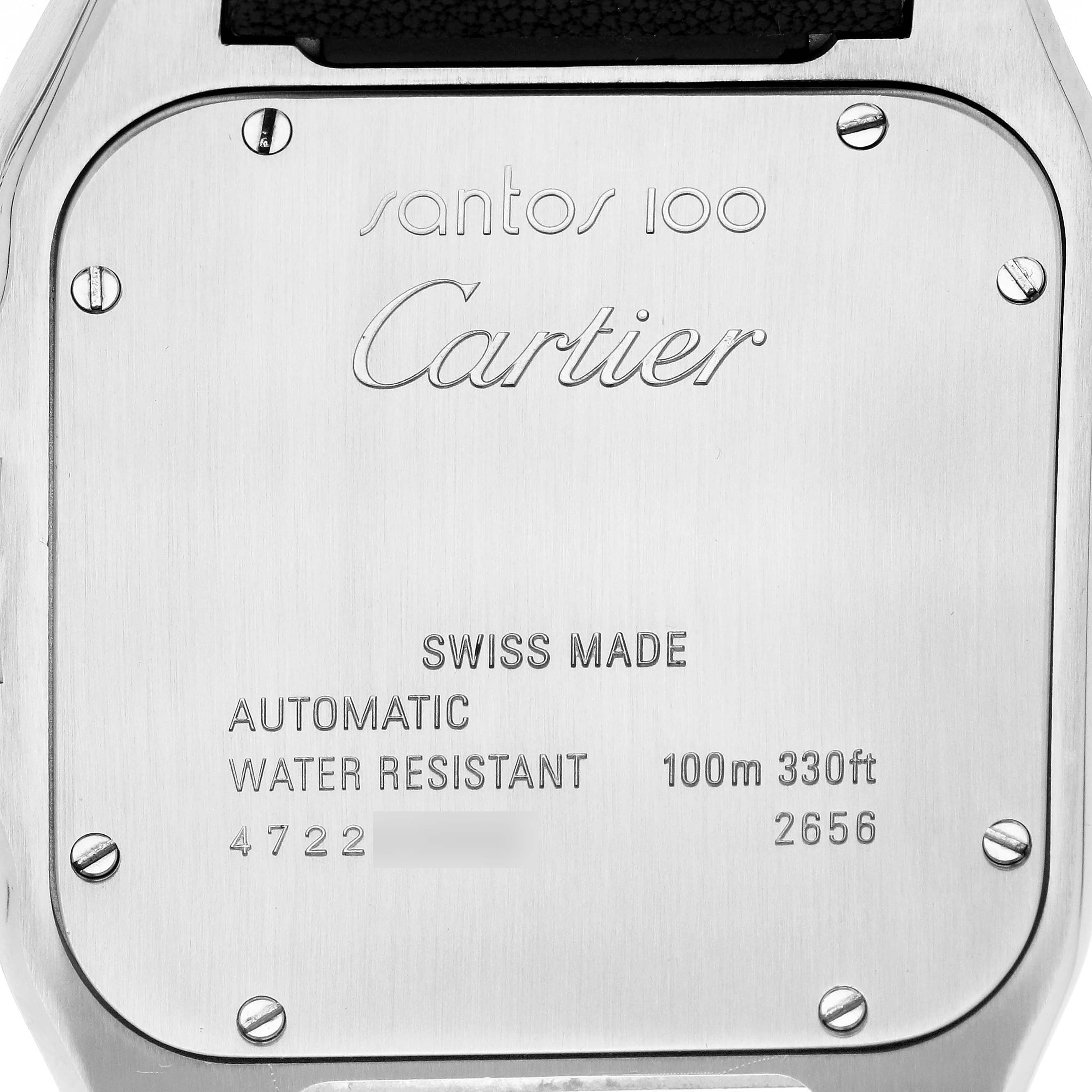 The image shows the case back of the Cartier Santos W20072X7 Men's Steel and Gold (two tone) Silver Dial 100, displaying branding, specifications, and screw details.
