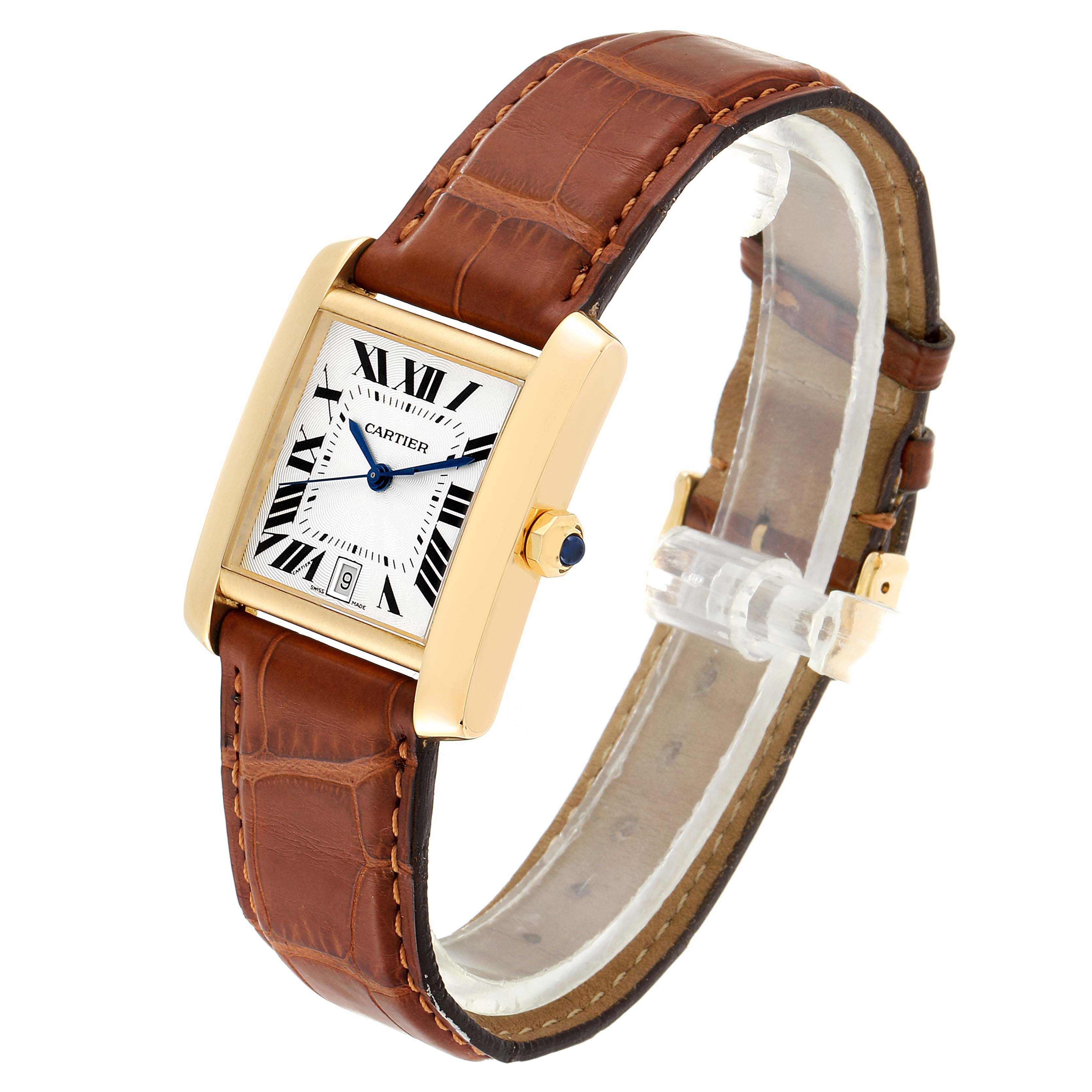 The image shows a Cartier Tank Francaise W5000156 Men's Yellow Gold Silver Dial W5000156 Men's Yellow Gold Silver Dial watch at an angle highlighting its face, crown, and brown leather strap.