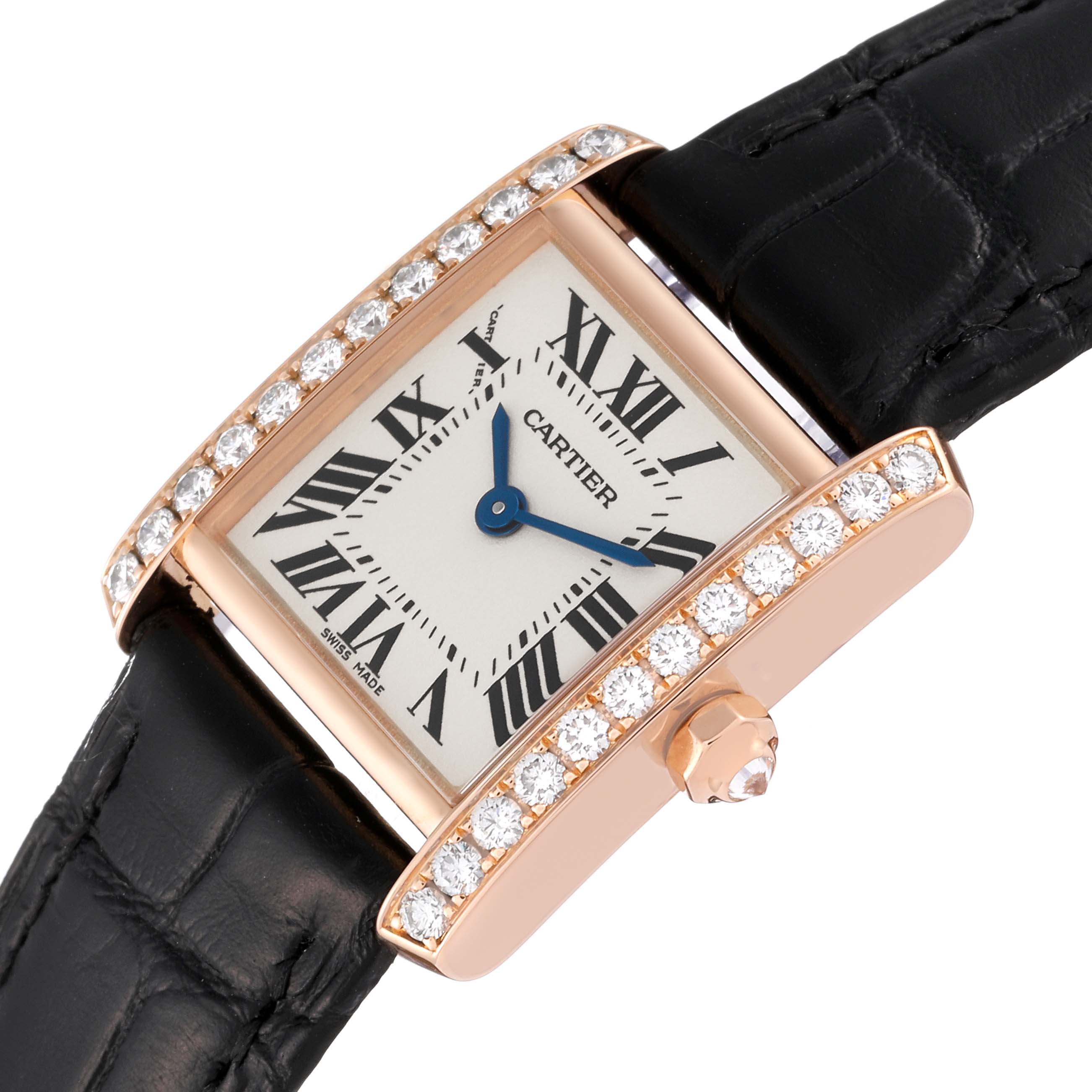 This image shows a Cartier Tank Francaise WE104531 Women's Rose Gold Silver Dial WE104531 Women's Rose Gold Silver Dial watch with a rose gold case, diamond bezel, black leather strap, and blue hands at an angled view.
