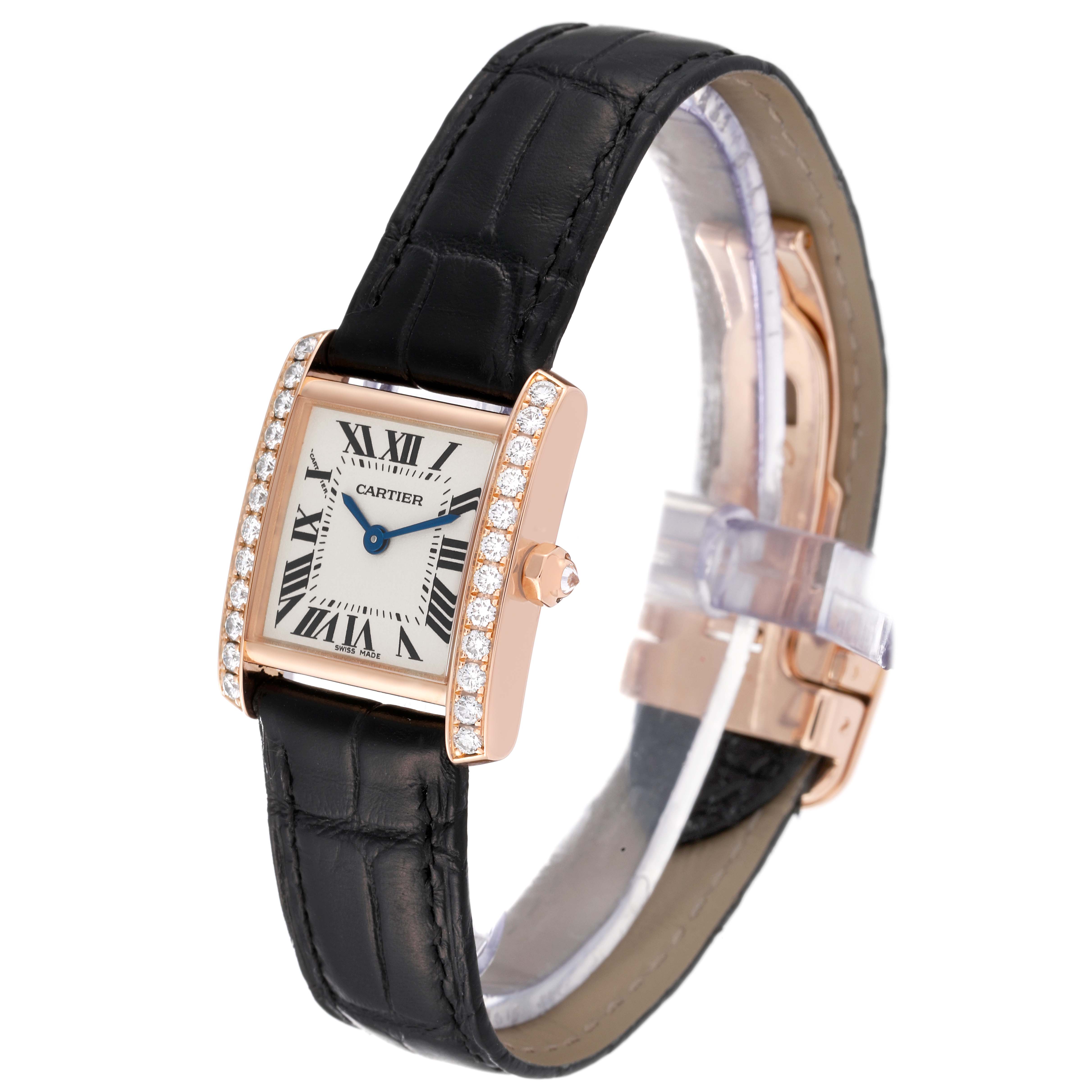 This Cartier Tank Francaise WE104531 Women's Rose Gold Silver Dial WE104531 Women's Rose Gold Silver Dial watch is shown at a slight angle highlighting the face, black strap, and diamond-encrusted bezel.