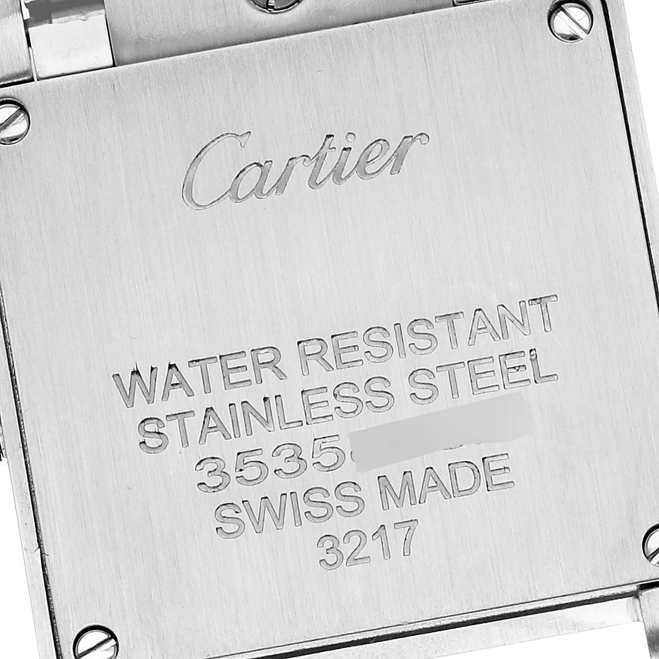 The image shows the back case of a Cartier Tank Francaise W51008Q3 Women
s Stainless Steel Silver Dial W51008Q3 Women
s Stainless Steel Silver Dial watch, highlighting its water resistance and stainless steel material.