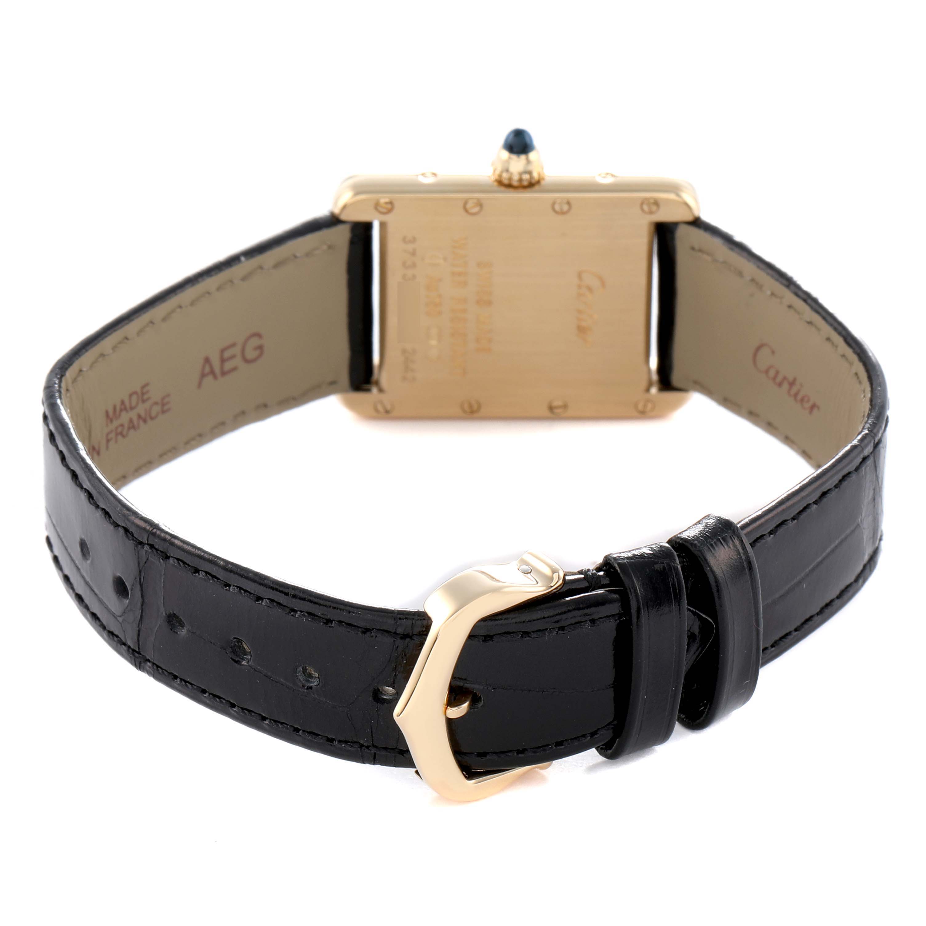 The image shows the back view of a Cartier Tank Louis W1529856 Women's Yellow Gold Silver Dial watch, highlighting the case back, straps, and clasp.