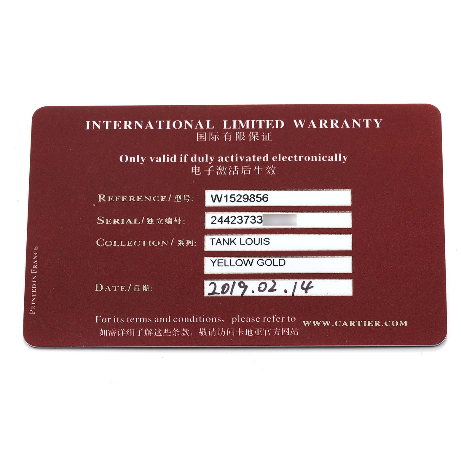 This image shows an International Limited Warranty card for the Cartier Tank Louis W1529856 Women's Yellow Gold Silver Dial watch, detailing reference, serial number, and collection.