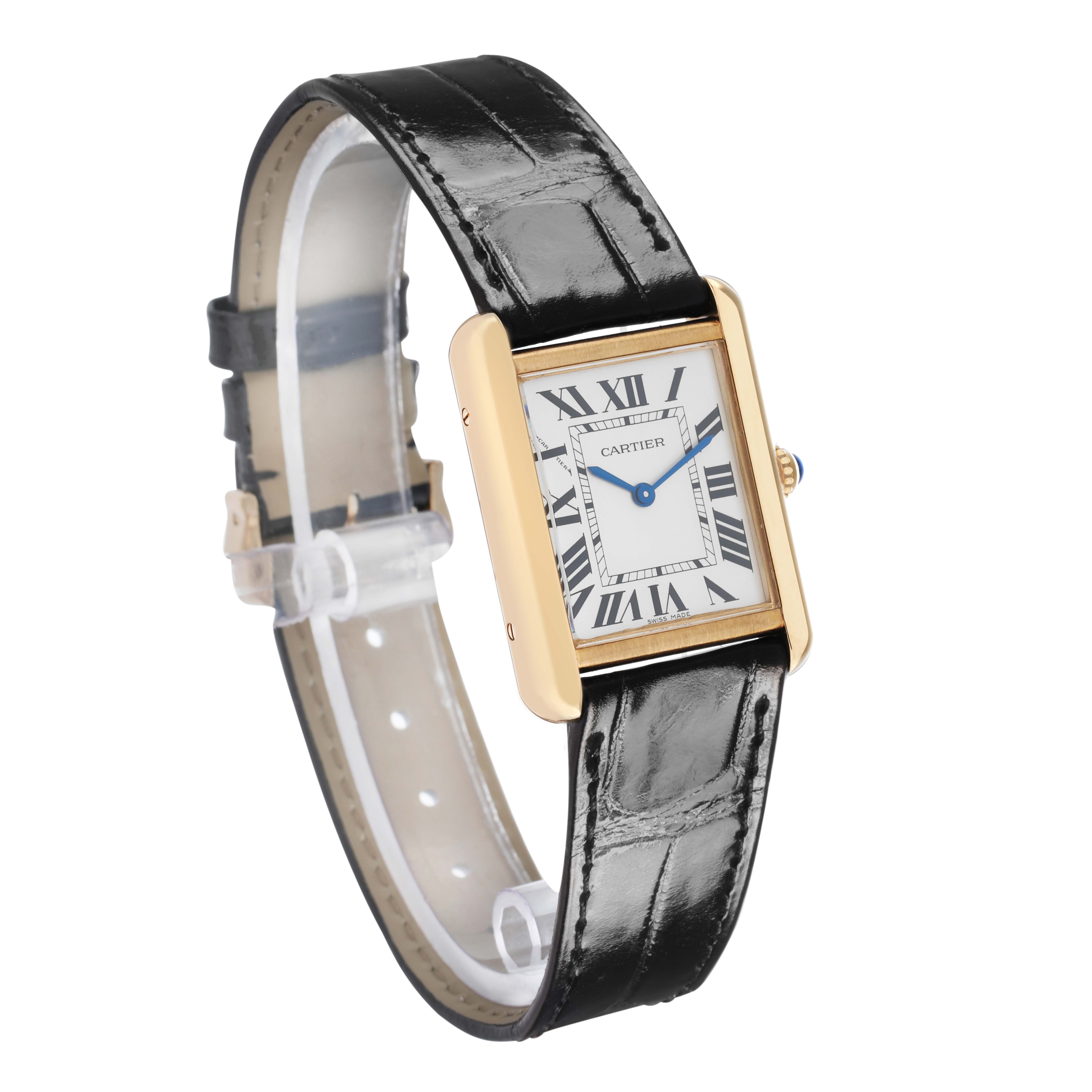 The Cartier Tank Solo W1018755 Women's Steel and Gold (two tone) Silver Dial watch is shown at an angle displaying its face, Roman numerals, and black leather strap.