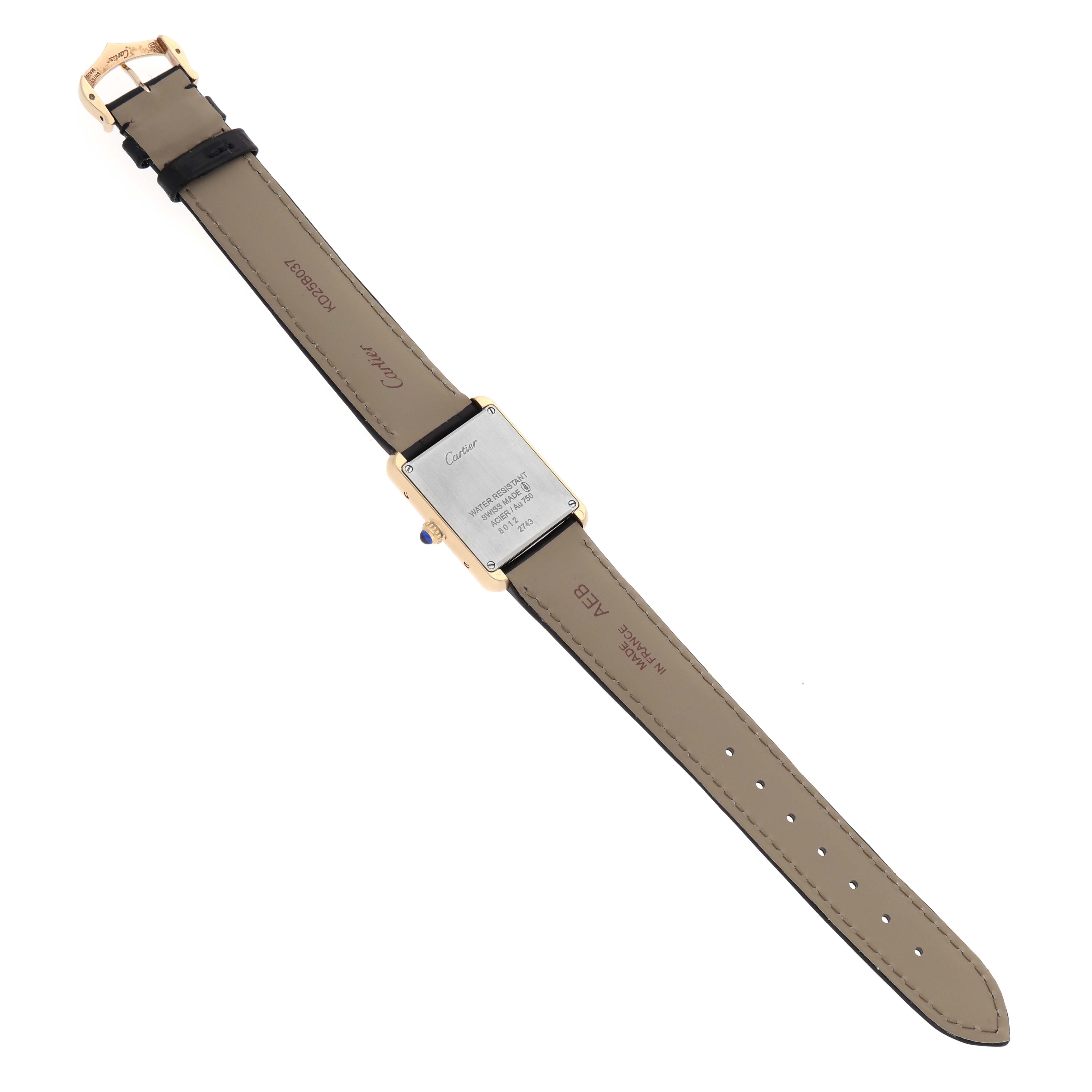 The image shows the back view of a Cartier Tank Solo W1018755 Women's Steel and Gold (two tone) Silver Dial watch, highlighting the case back, leather strap, and buckle.