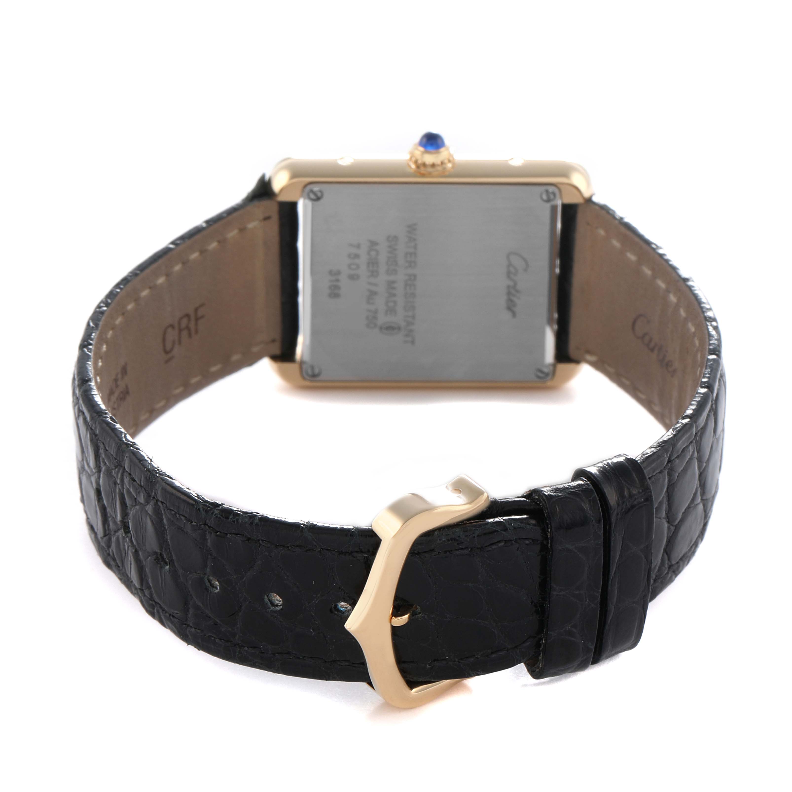 The image shows the back of a Cartier Tank Solo W5200002 Women's Steel and Gold (two tone) Silver Dial watch, highlighting the case back and leather strap with buckle.