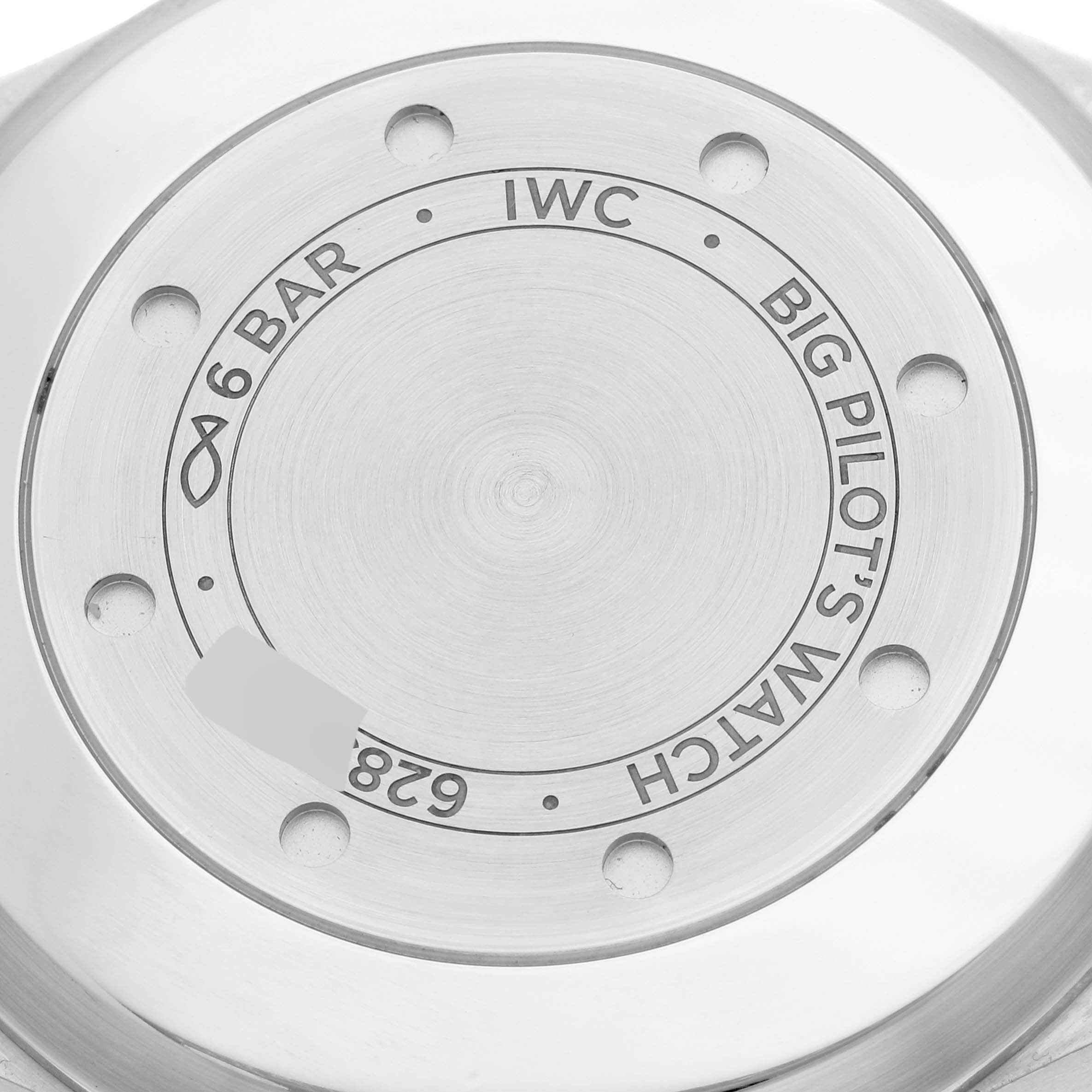 This image shows the case back of an IWC Big Pilot's Watch from a straight-on angle.