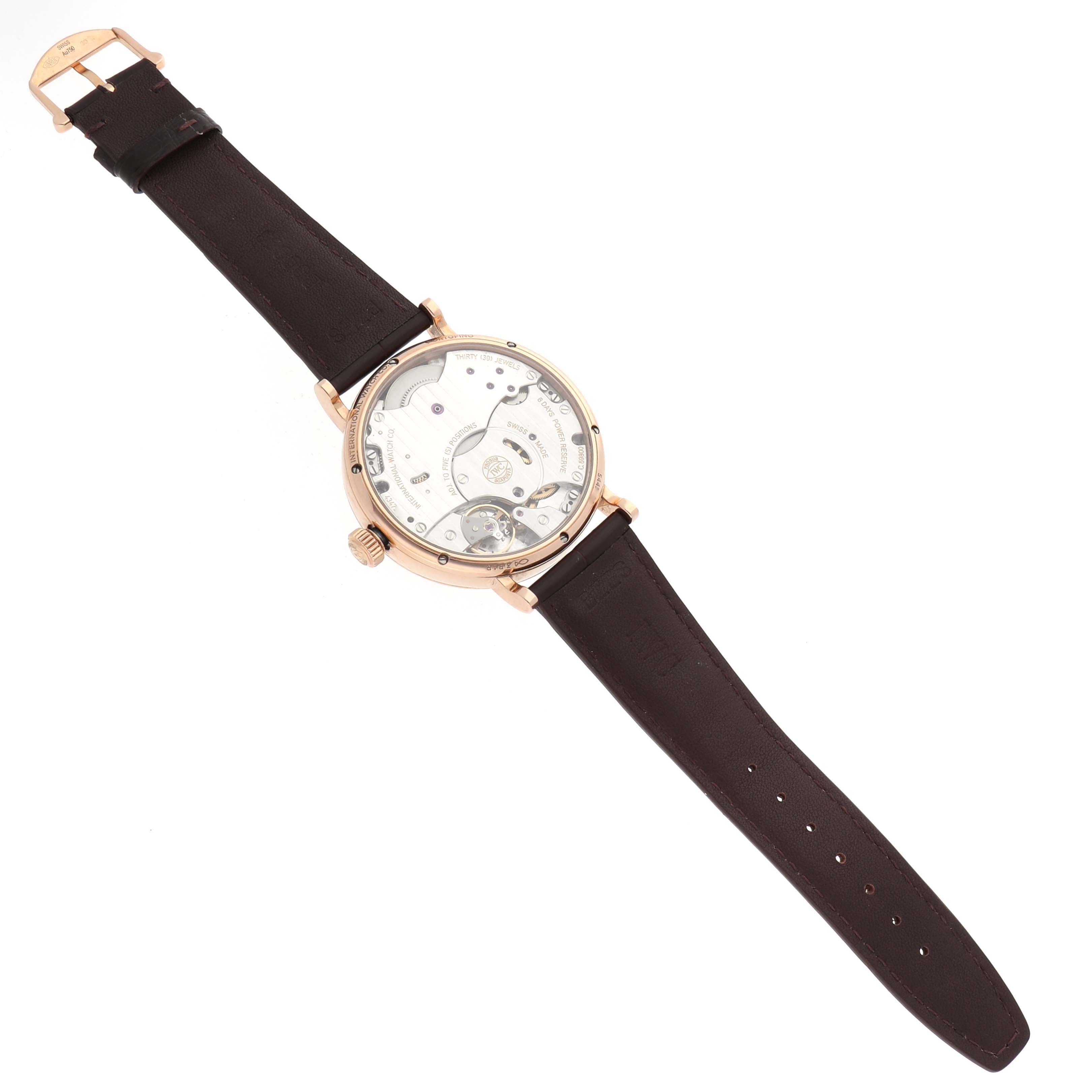 The IWC Portofino IW516403 Men's Rose Gold Grey Dial watch is shown from the rear, displaying its transparent case back and mechanical movement.