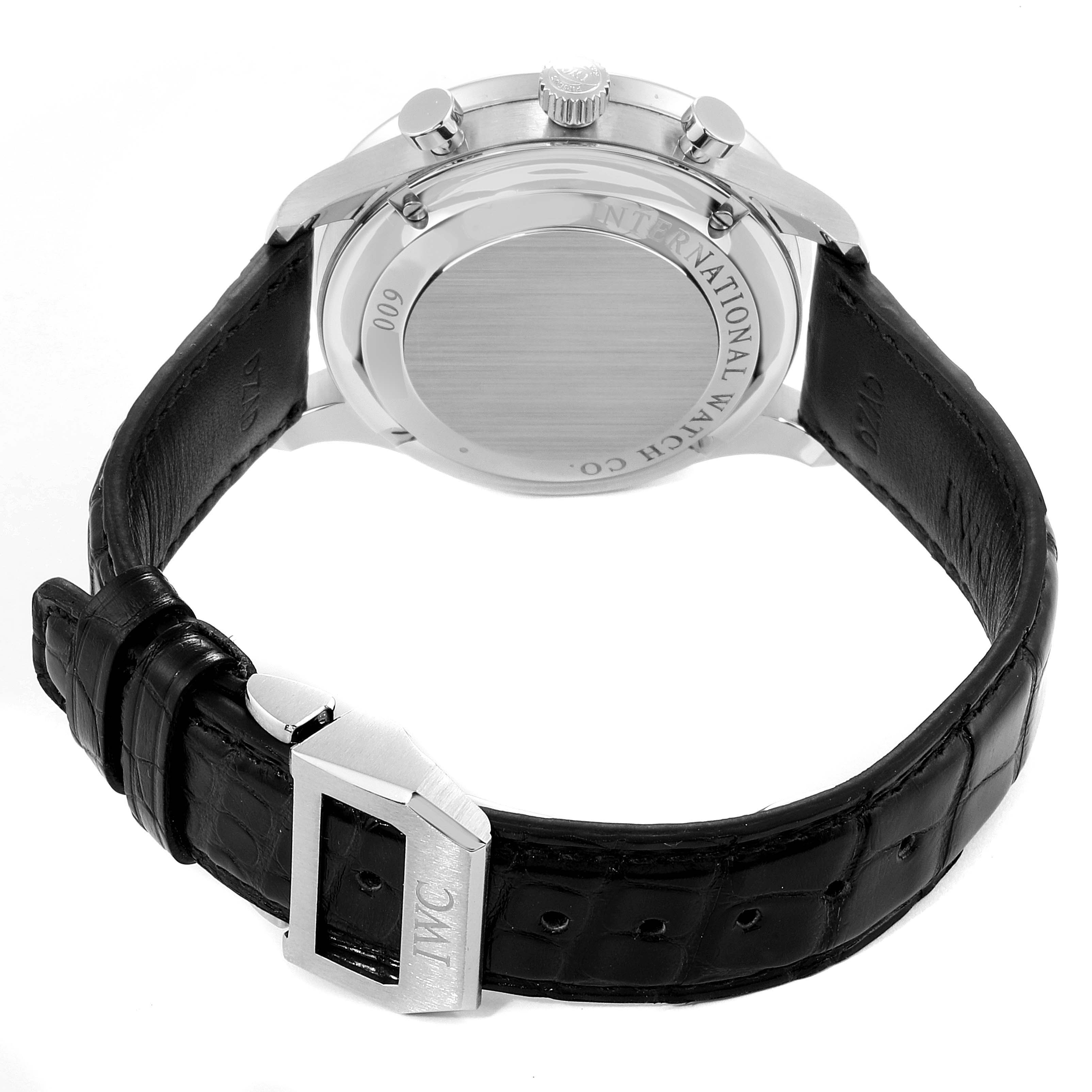 This image shows the rear view of the IWC Portuguese IW371446 Men's Stainless Steel Silver Dial IW371446 Men's Stainless Steel Silver Dial model watch, featuring its back case and leather strap with an IWC buckle.