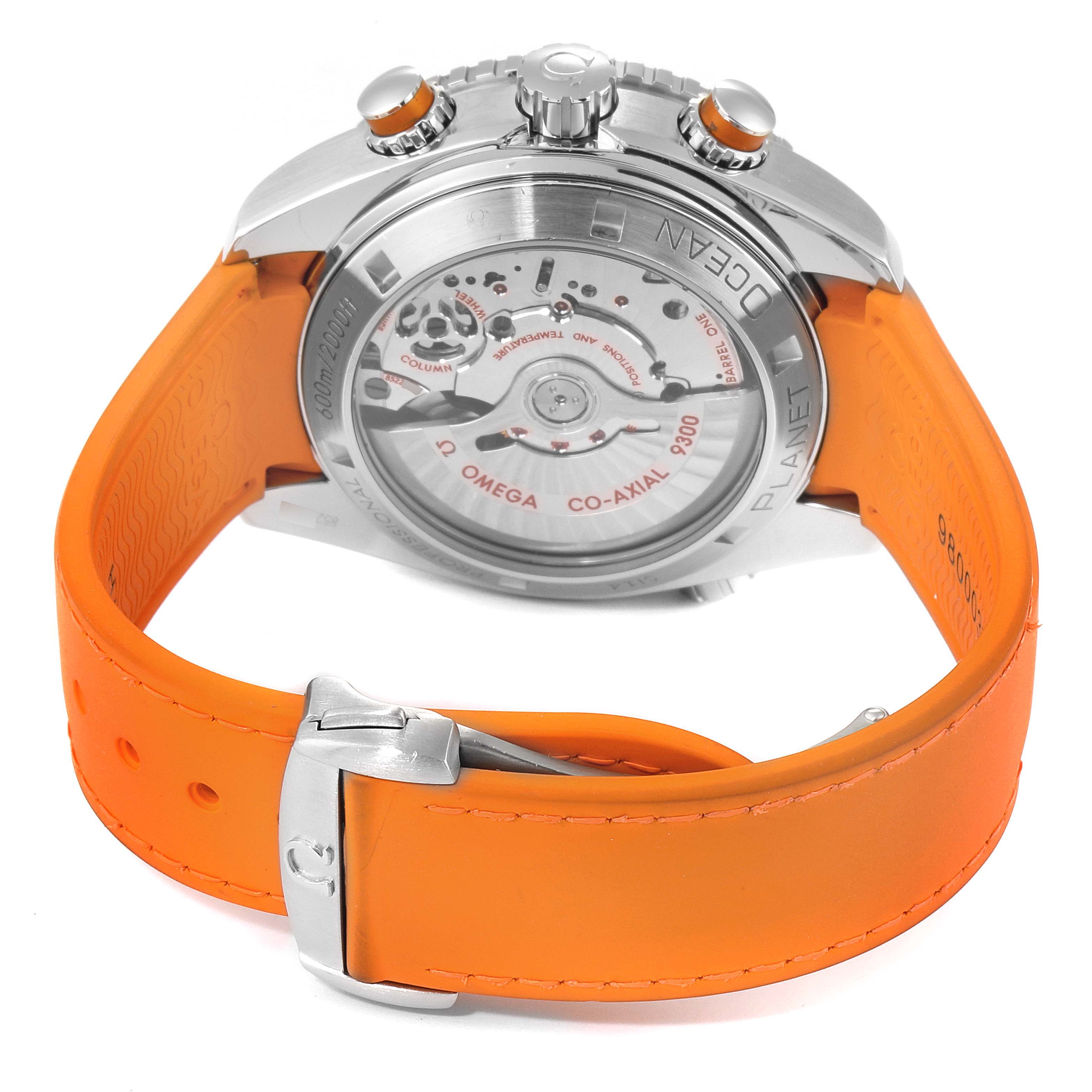 The image shows the back view of the Omega Seamaster 232.32.46.51.01.001 Men
s Stainless Steel Black Dial 232.32.46.51.01.001 Men
s Stainless Steel Black Dial watch, highlighting its transparent case back and orange strap.