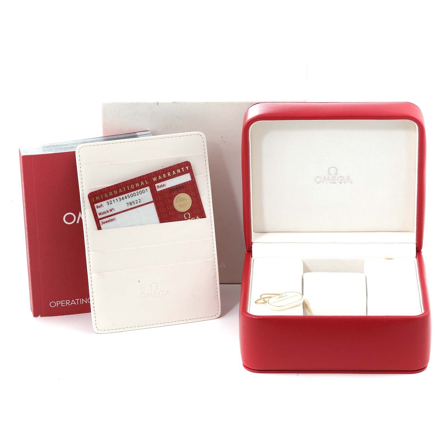 The image shows an Omega Speedmaster 321.13.44.50.02.001 Men's Stainless Steel Silver Dial 321.13.44.50.02.001 Men's Stainless Steel Silver Dial watch box set, including an open red box, a warranty card holder, and an instruction manual.