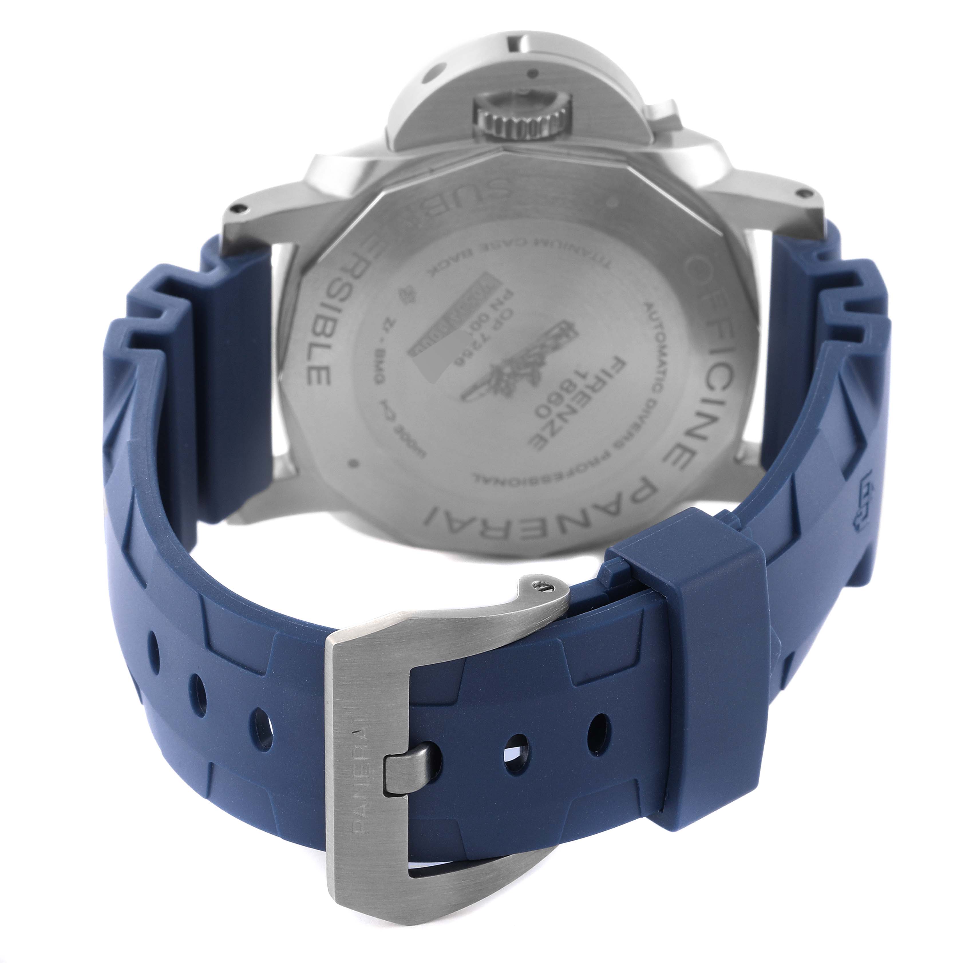 The Panerai Submersible PAM00692 Men's Titanium Blue Dial PAM00692 Men's Titanium Blue Dial watch is shown from the back, highlighting its case back and blue rubber strap with a buckle.