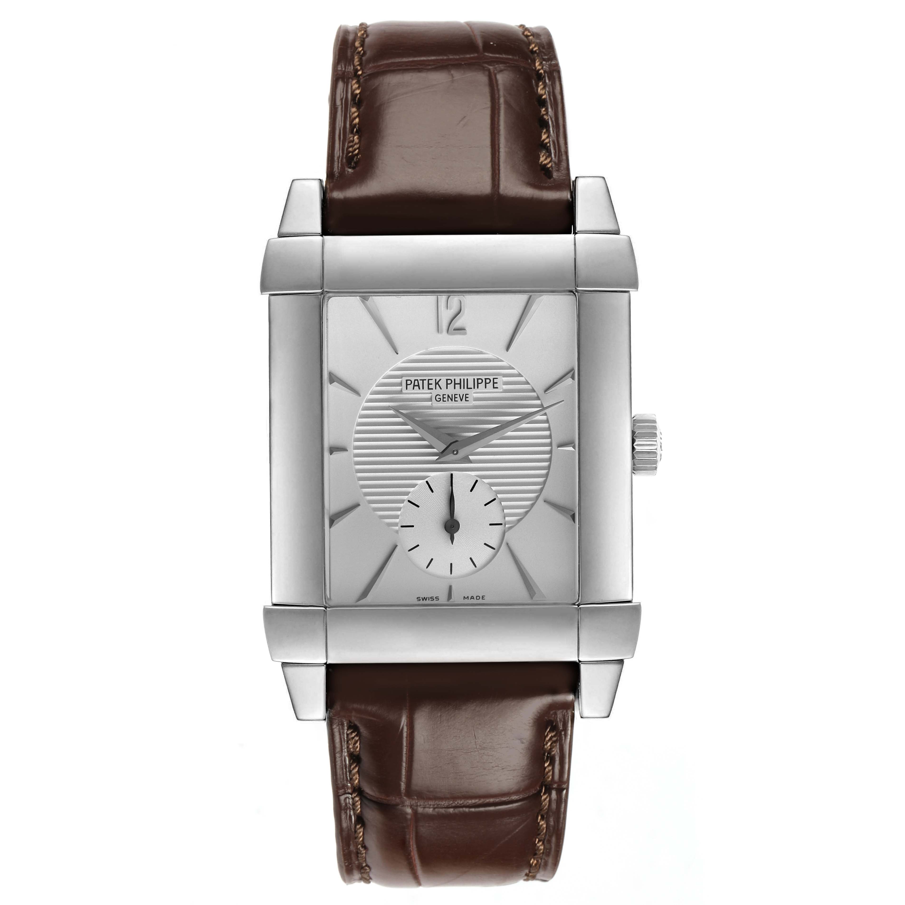 The Patek Philippe Gondolo 5111G Men's White Gold Silver Dial watch is shown from a front angle, highlighting its rectangular face and leather strap.
