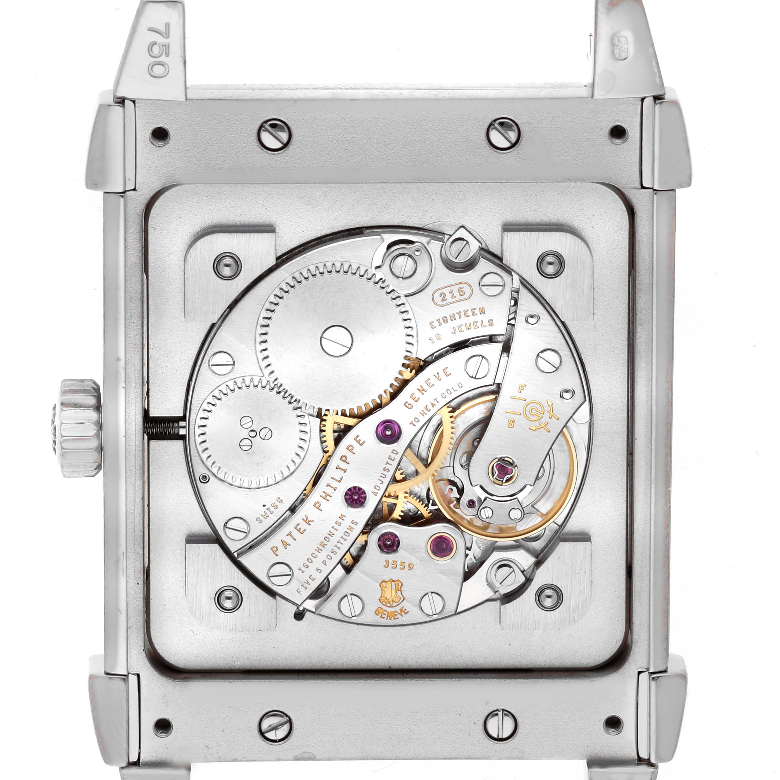 The image shows the back view of a Patek Philippe Gondolo 5111G Men's White Gold Silver Dial, highlighting its intricate movement and internal mechanics.