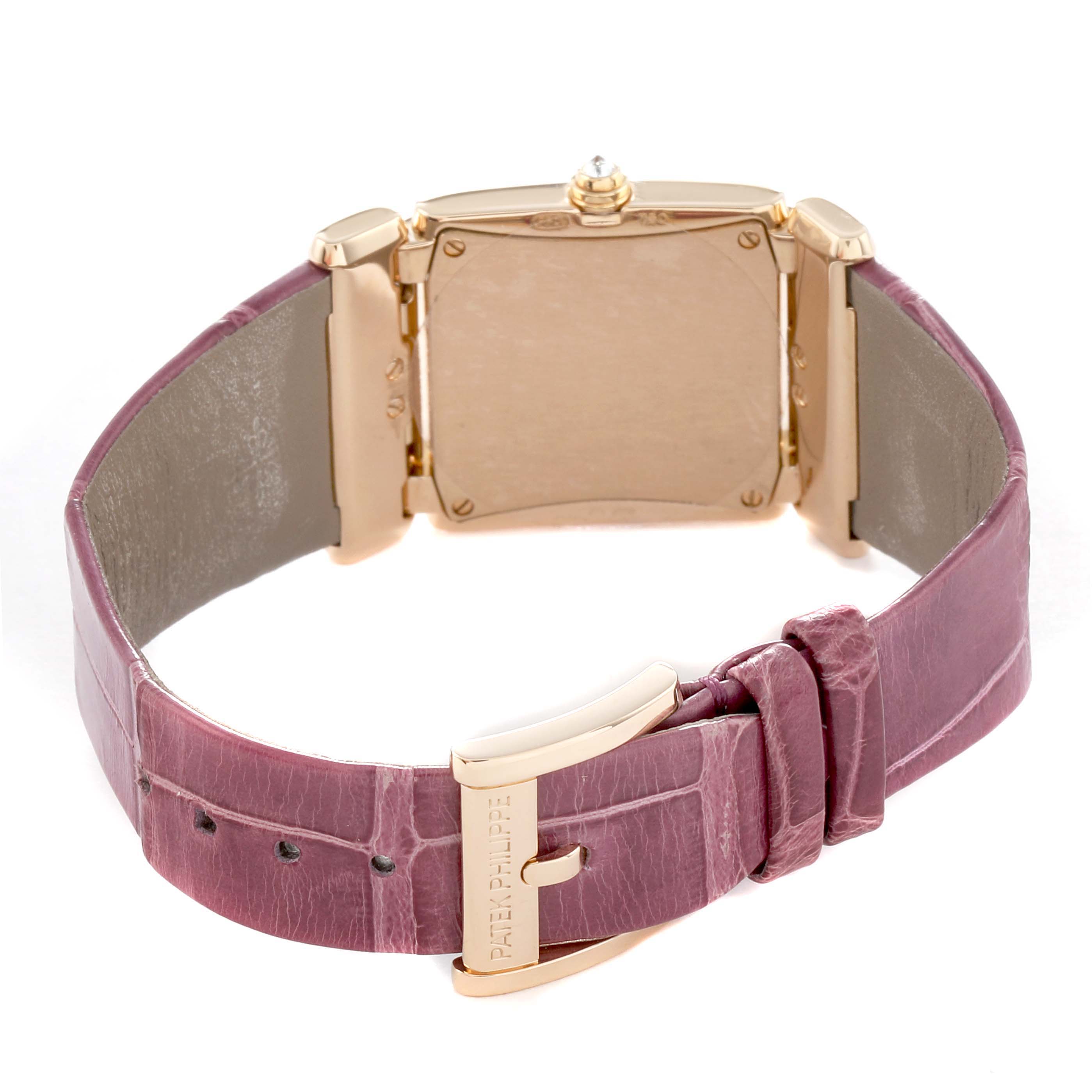 The image shows the back view of a Patek Philippe Twenty-4 4920R Women's Rose Gold Silver Dial model, highlighting the case back and leather strap with buckle.