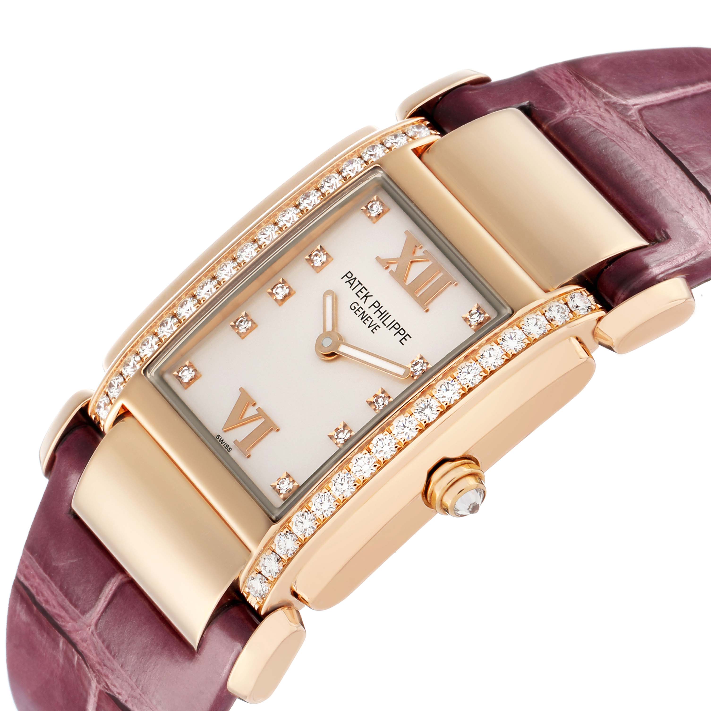 The Patek Philippe Twenty-4 4920R Women's Rose Gold Silver Dial watch is shown at an angle, highlighting the diamond-set bezel, dial, and burgundy strap.