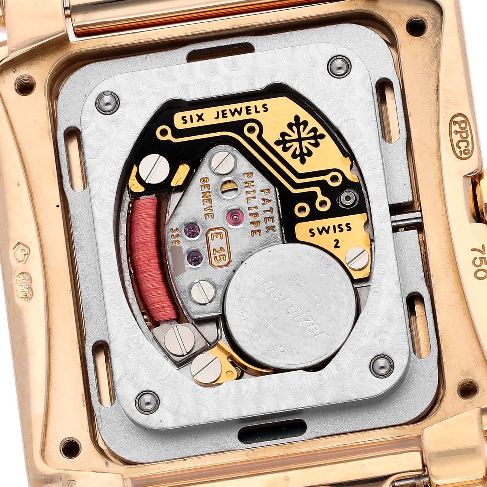 The image shows the inner mechanism and battery of a Patek Philippe Twenty-4 4920R Women's Rose Gold Silver Dial watch, viewed from the back.