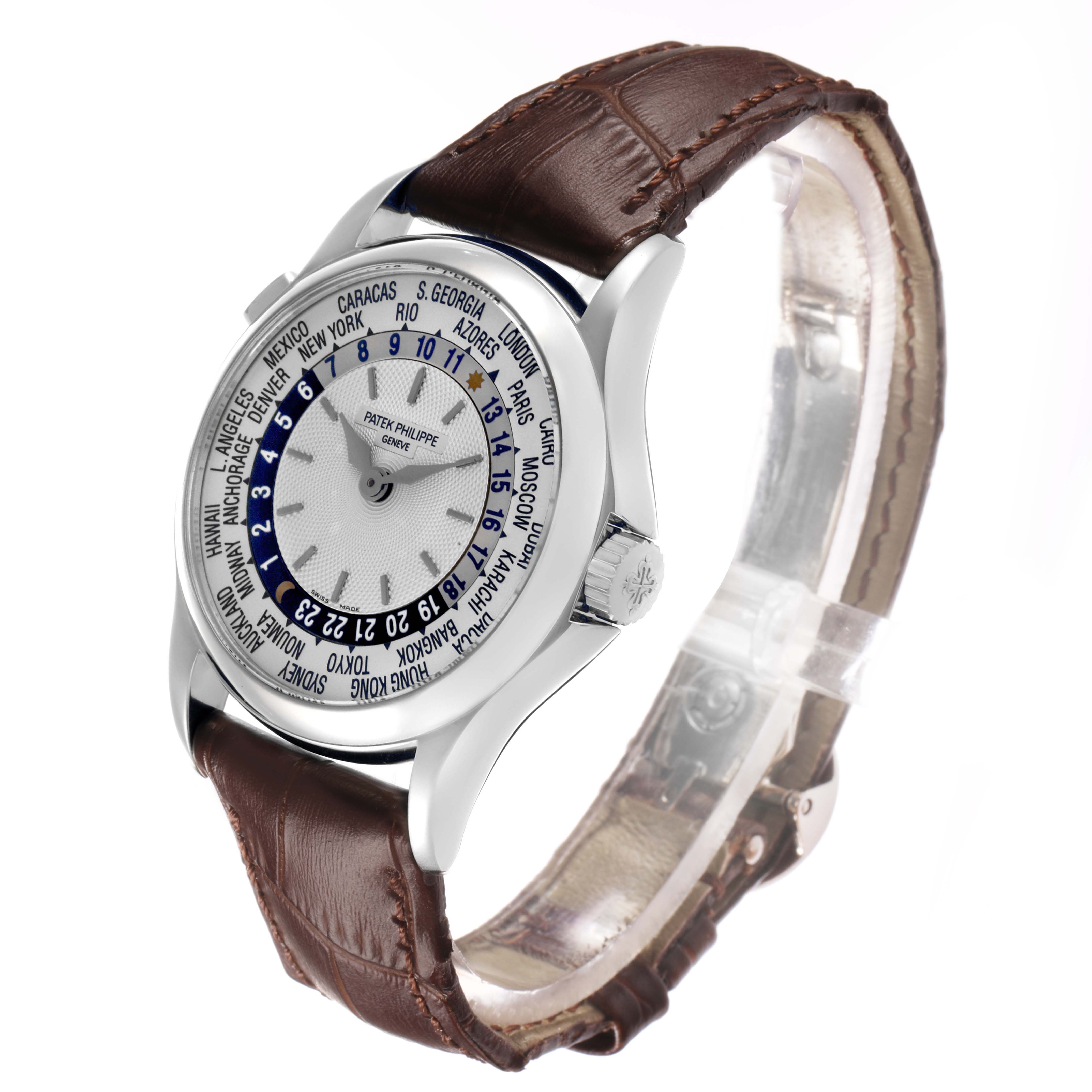 This Patek Philippe Complications 5110G Men's White Gold Silver Dial watch is shown at a slight side angle, highlighting the dial, bezel, crown, and brown leather strap.