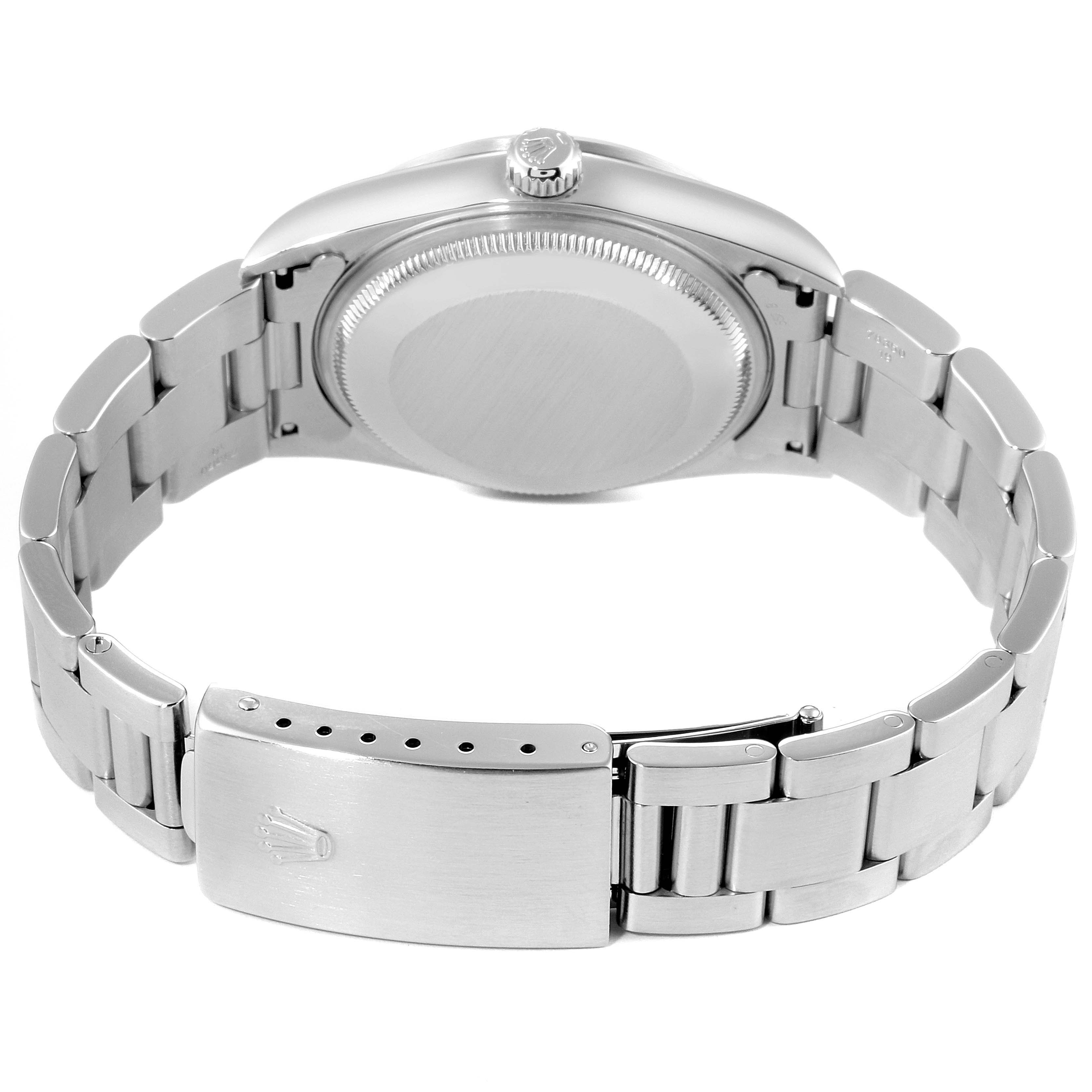 The image shows the back case and bracelet clasp of a Rolex Air-King 14000 Men's Stainless Steel Black Dial 14000 Men's Stainless Steel Black Dial watch from a slightly elevated rear angle.