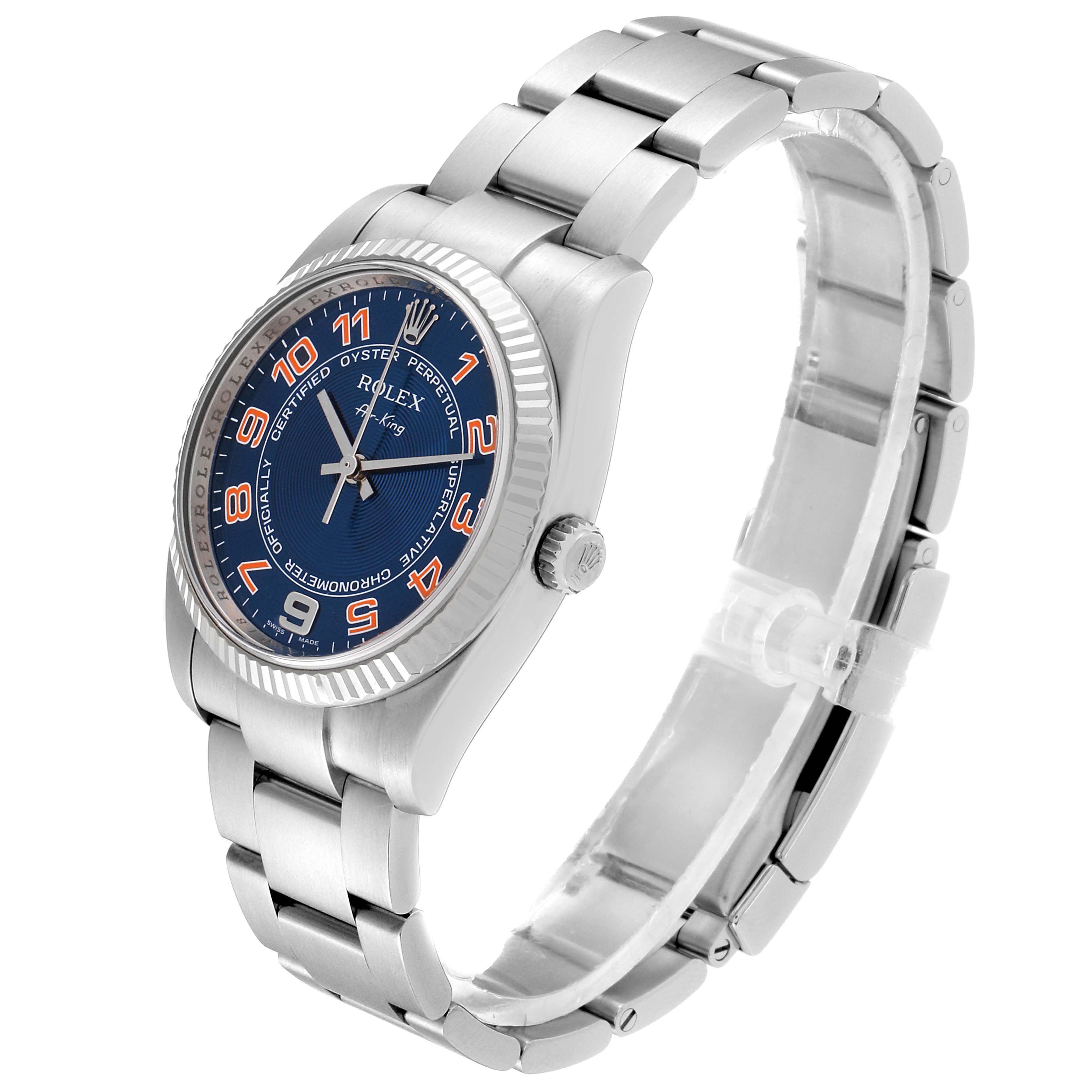 The Rolex Air-King 114234 Men's Stainless Steel Blue Dial 114234 Men's Stainless Steel Blue Dial watch is shown at a slight angle from the side, displaying the face, bezel, crown, and bracelet.