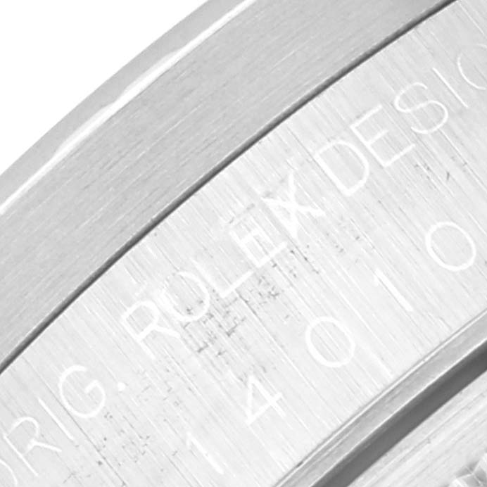 This close-up image of the Rolex Air-King 14010 Men's Stainless Steel Grey Dial 14010 Men's Stainless Steel Grey Dial watch shows the engraved text on its metal casing.