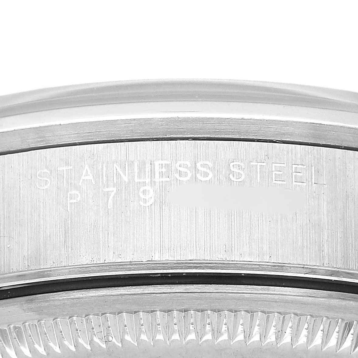 The image shows a close-up of the stainless steel case side of a Rolex Air-King 14000 Men's Stainless Steel Black Dial watch, highlighting engraved details.