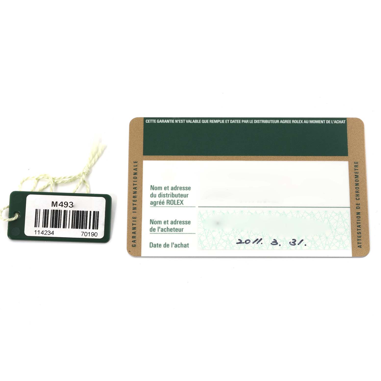 The image shows the warranty card and a tag for the Rolex Air-King 114234 Men's Stainless Steel White Dial 114234 Men's Stainless Steel White Dial watch, displayed flat.