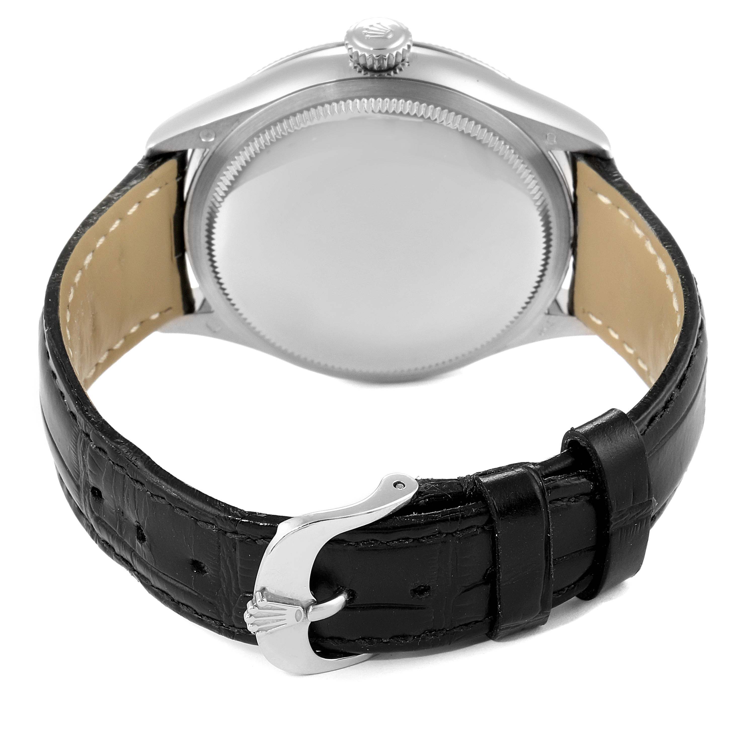 This image shows the back view of a Rolex Cellini 50509 Men
s White Gold White Dial 50509 Men
s White Gold White Dial watch, displaying the case back, crown, and black leather strap with a buckle.