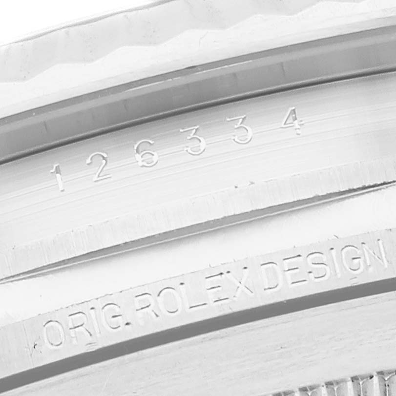 This close-up image of a Rolex Datejust 41 126334 Men
s Stainless Steel Black Dial 126334 Men
s Stainless Steel Black Dial shows its model number 126334 and part of the engraving "Orig Rolex Design."