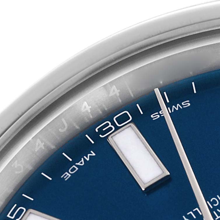 This image shows a close-up of the dial and bezel of the Rolex Datejust 41 116300 Men's Stainless Steel Blue Dial 116300 Men's Stainless Steel Blue Dial, featuring part of its blue dial and hour markers.