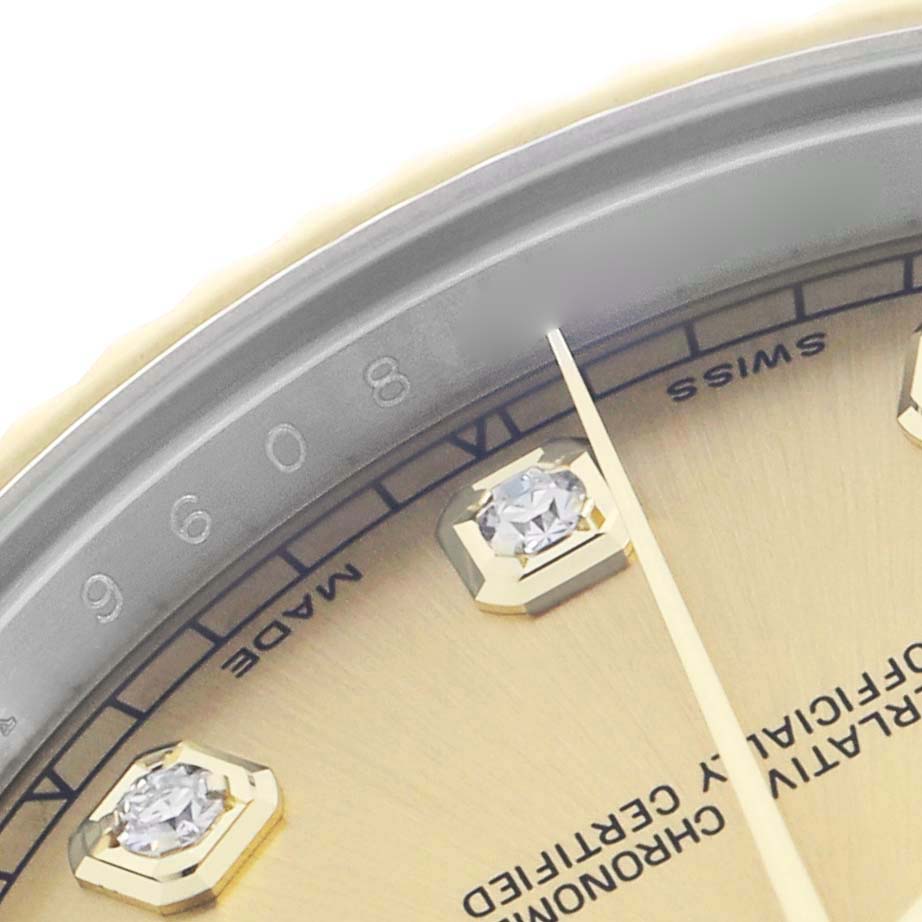 The image shows a close-up of the dial and diamond hour markers of a Rolex Datejust 41 116333 Men's Steel and Gold (two tone) Champagne Dial, highlighting the edge and text details.