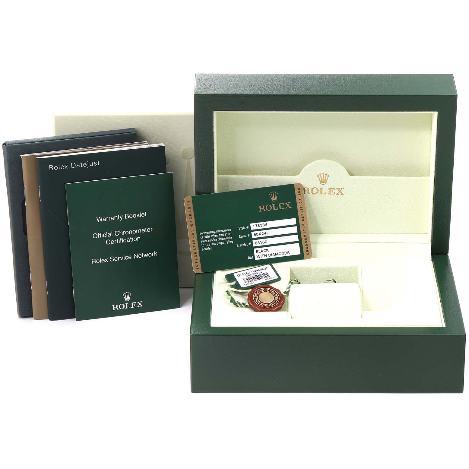 This image shows the packaging, warranty booklets, and certification card for the Mid-Size Rolex watch.