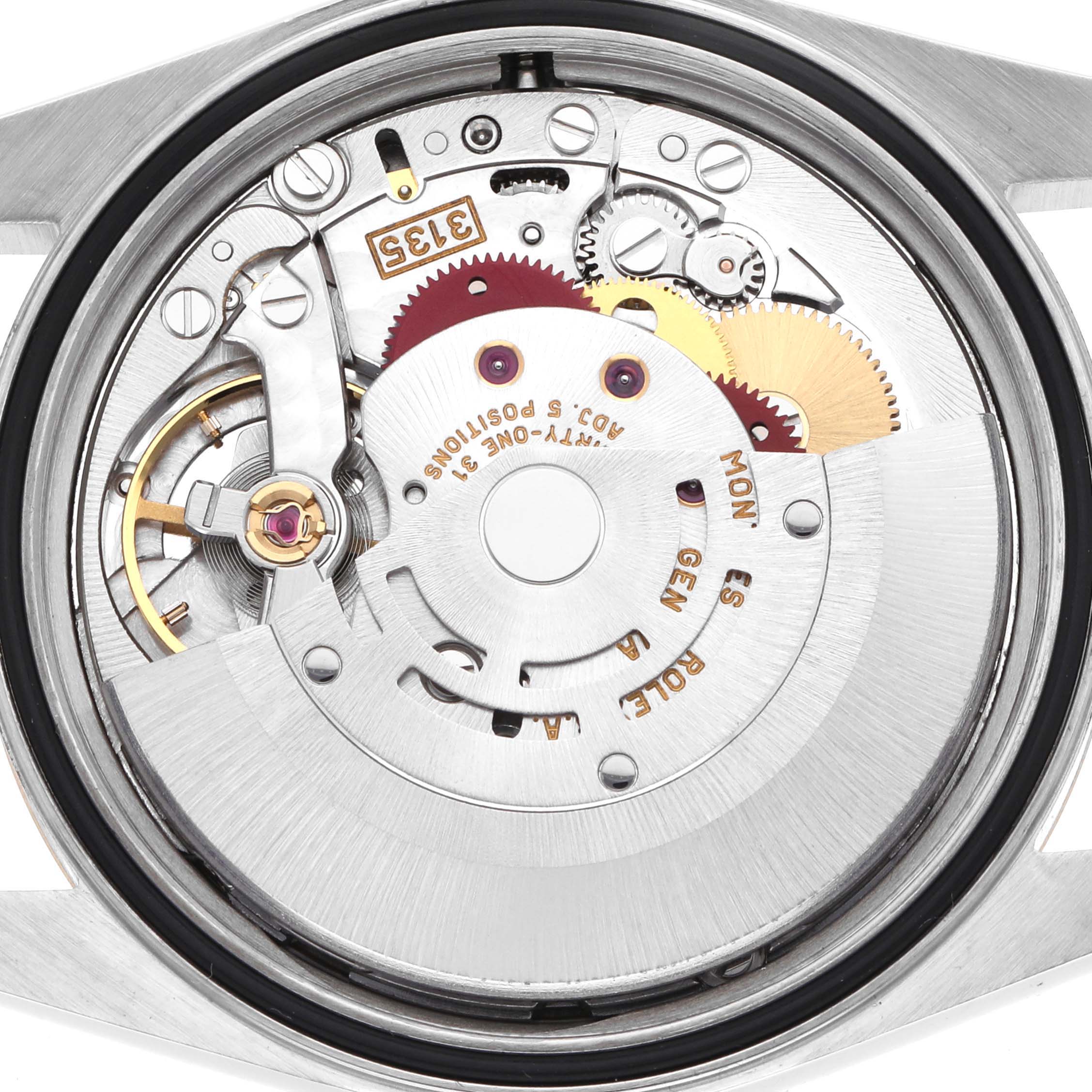The image shows the movement of a Rolex Datejust 16233 Men's Steel and Gold (two tone) Champagne Dial watch from a top-down angle, highlighting gears and the rotor mechanism.